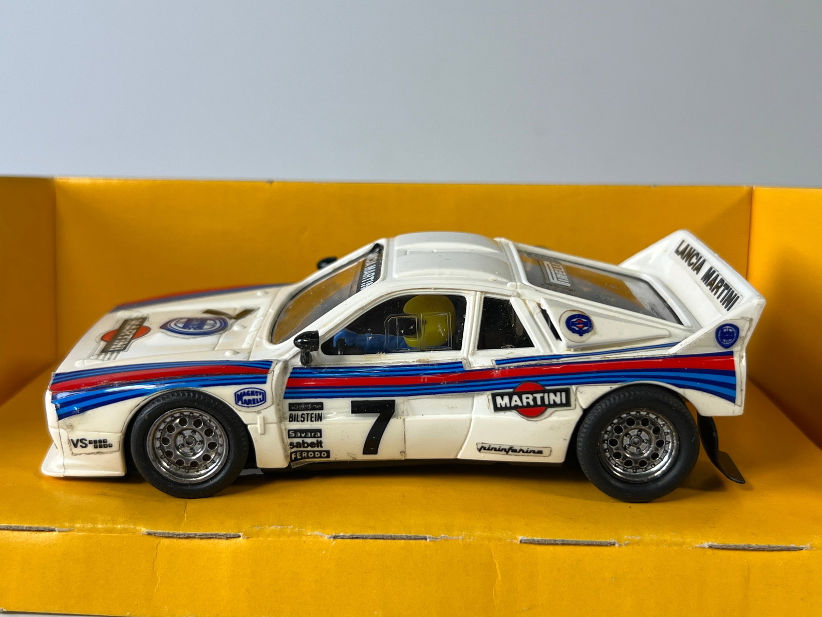 Scalextric Lancia Martini Racing #7: Scalextric Lancia Martini Racing #7 1/32 Slot Car, with original case. Case length: 7 inches. Weight: 5 oz. 