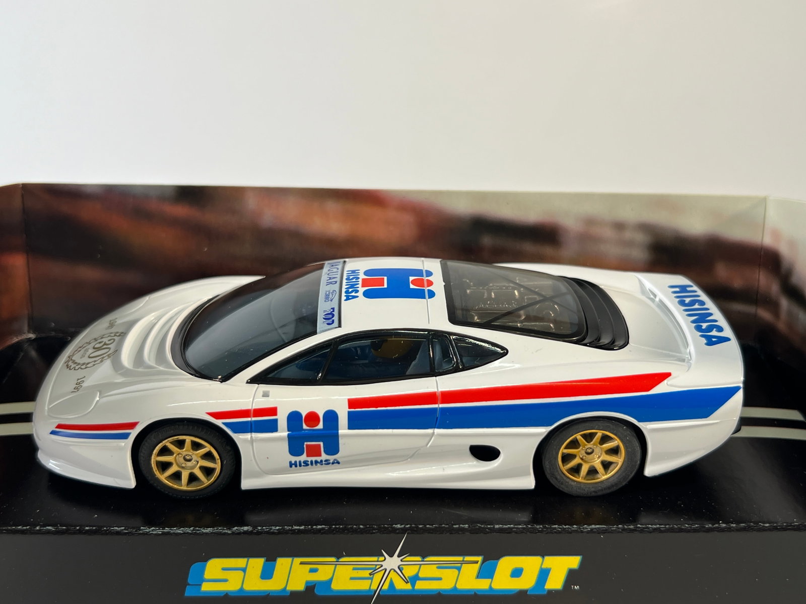 SuperSlot Jaguar XJ220: SuperSlot Jaguar XJ220 HISINSA 30 years 1/32 Slot Car, with original case. Weight: 6 oz.