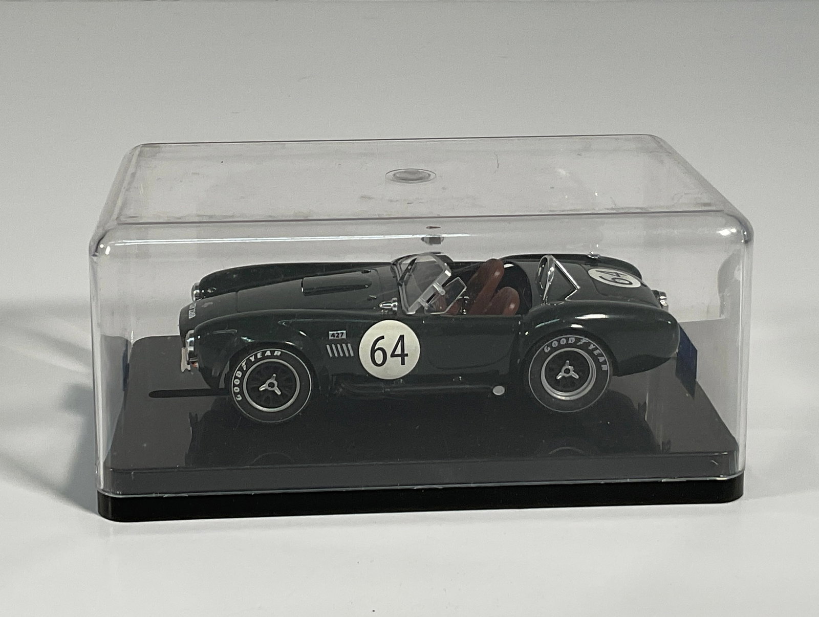 CGY 226B #64: CGY 226B #64 1/32 scale slot car, presented in its original display case. Weight: 6.2 oz. Dimensions: 6'' x 3 1/2'' x 2 3/4''. 