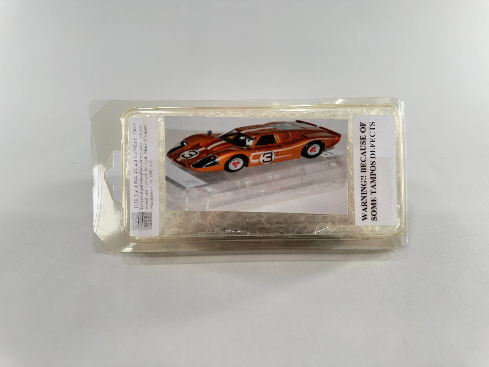 1967 Ford Mk IV Le Mans #3 1/32 Slot Car: 1967 Ford Mk IV Le Mans #3 1/32 Slot Car. The car measures 8 inches long, 3 7/8 inches wide, and 1 3/4 inches high. It weighs 3.5 oz. The item comes in its original packaging.