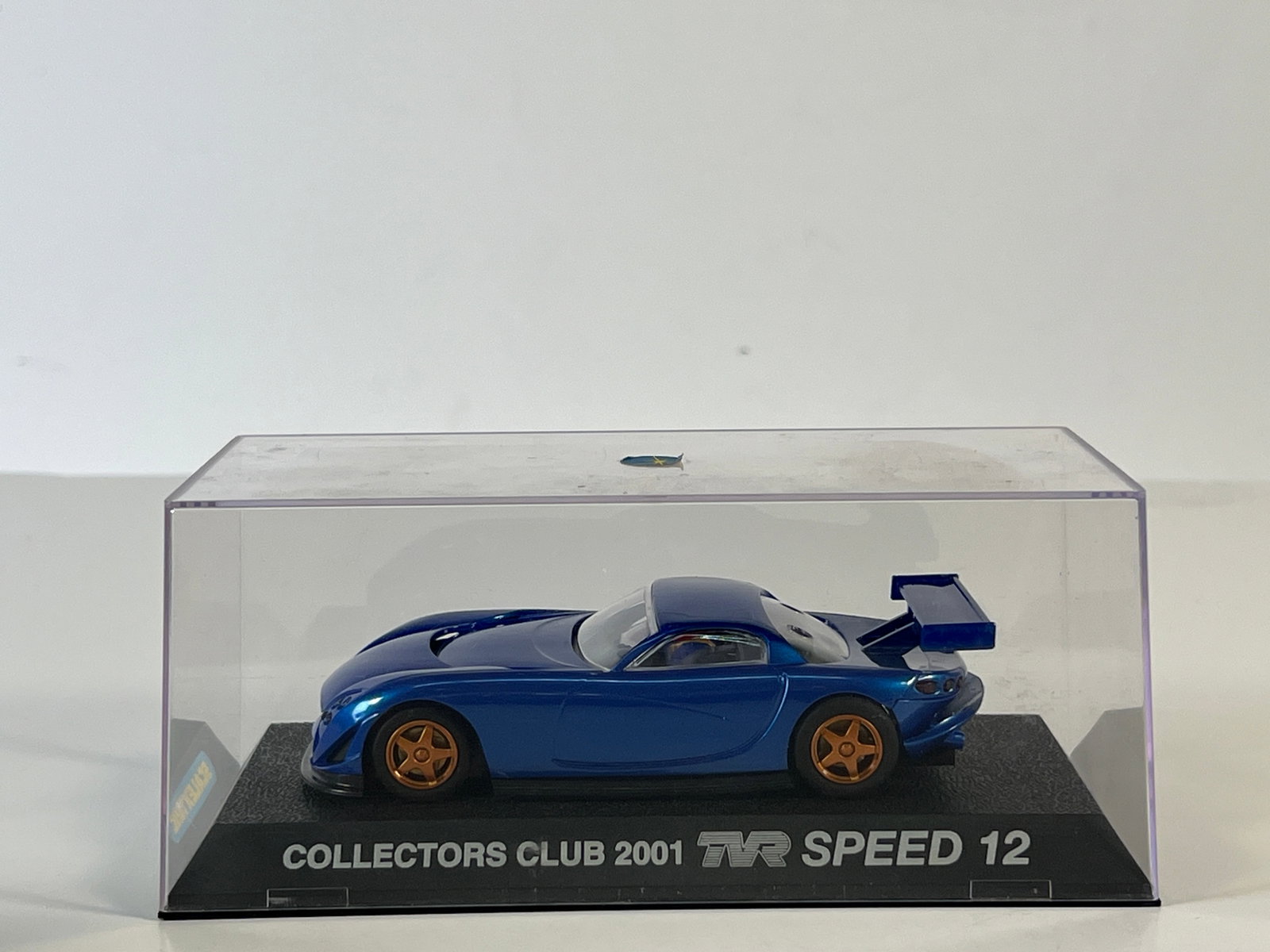 Scalextric TVR Speed 12 Collectors Club 2001: Scalextric TVR Speed 12 Collectors Club 2001 1/32 Slot Car, with original case. Weight: 8 oz.