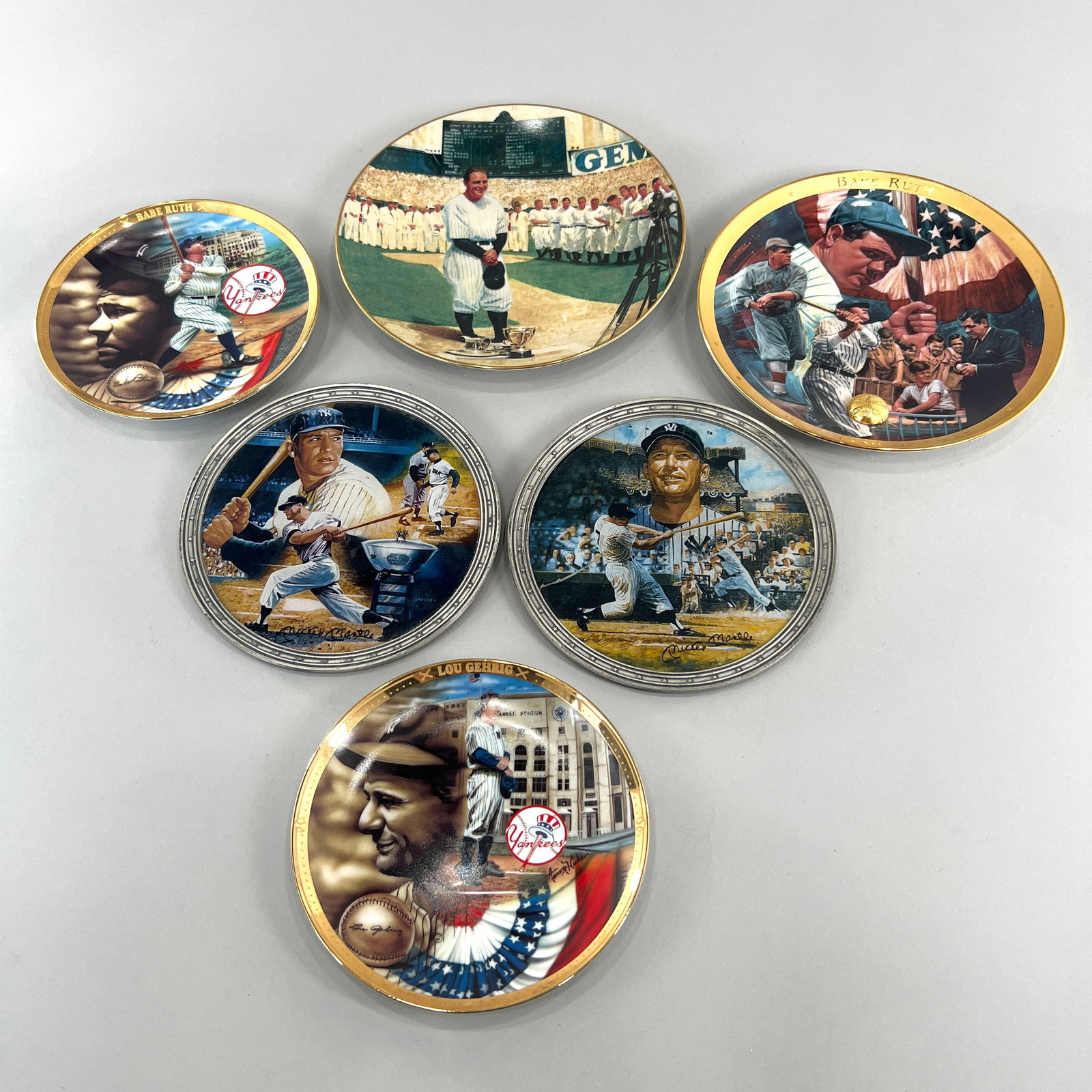 Group of Six New York Yankees Plates: Set of six decorative plates featuring Babe Ruth, Lou Gehrig, and Mickey Mantle. Includes 'The Legendary Babe Ruth' and 'Mickey Mantle Collection' plates. Largest one: 8.25''. 