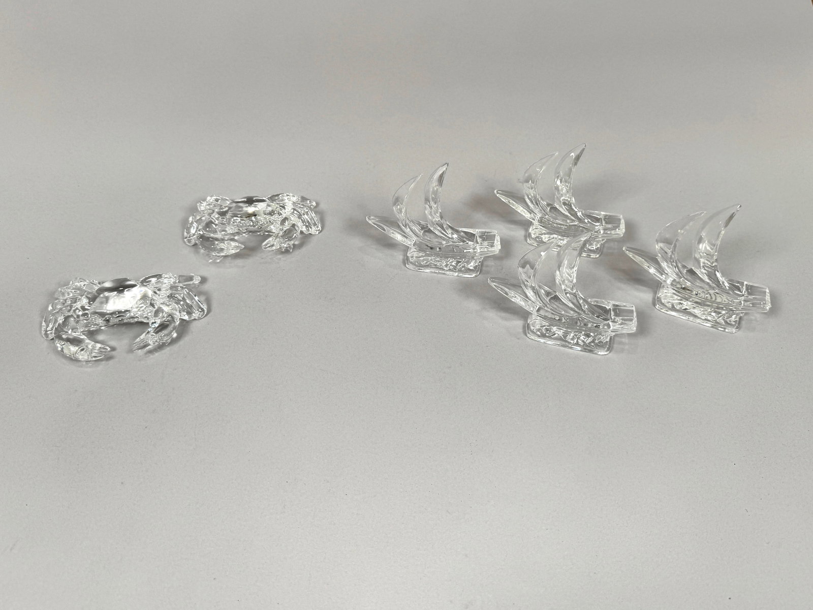 Group of Six Nautical Kristalcolor Glass Paperweights: Group of six Kristalcolor glass paperweights, two crabs and four sailboats. Longest Dimension: 5" Total Weight: 4 lbs