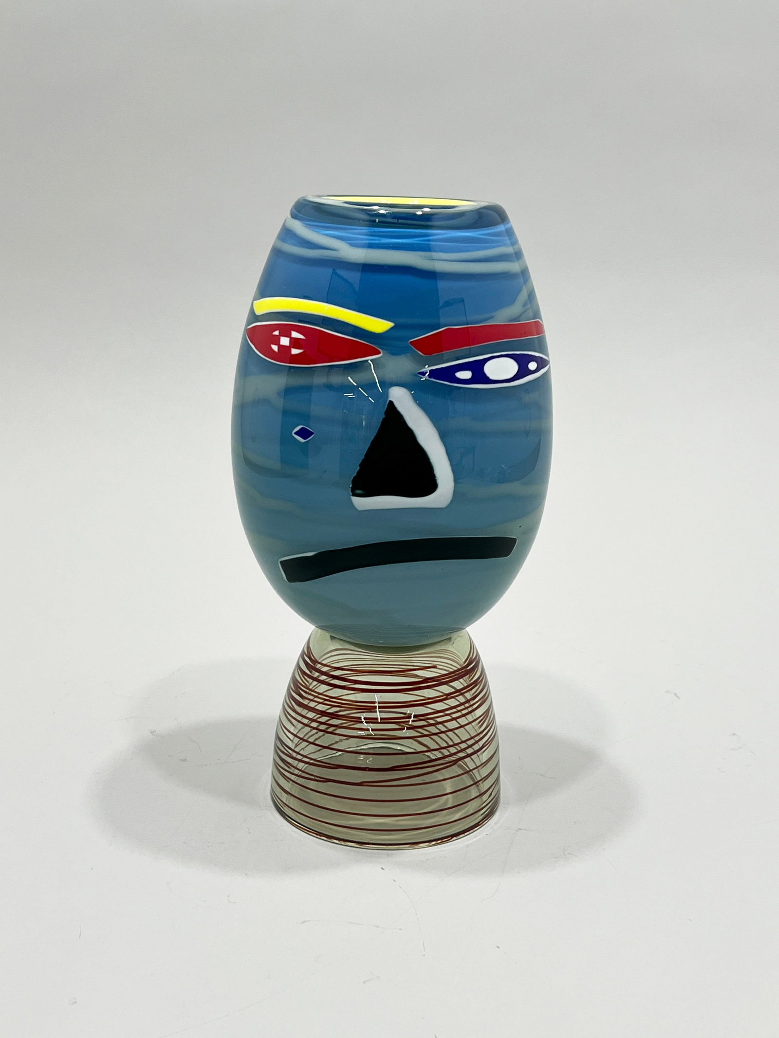 Art Glass Vessel: Art glass vessel, signed "Ed McIlvane 1986 Janus Series IV" on bottom. Measures 13'' and weighs 8lb 12oz.