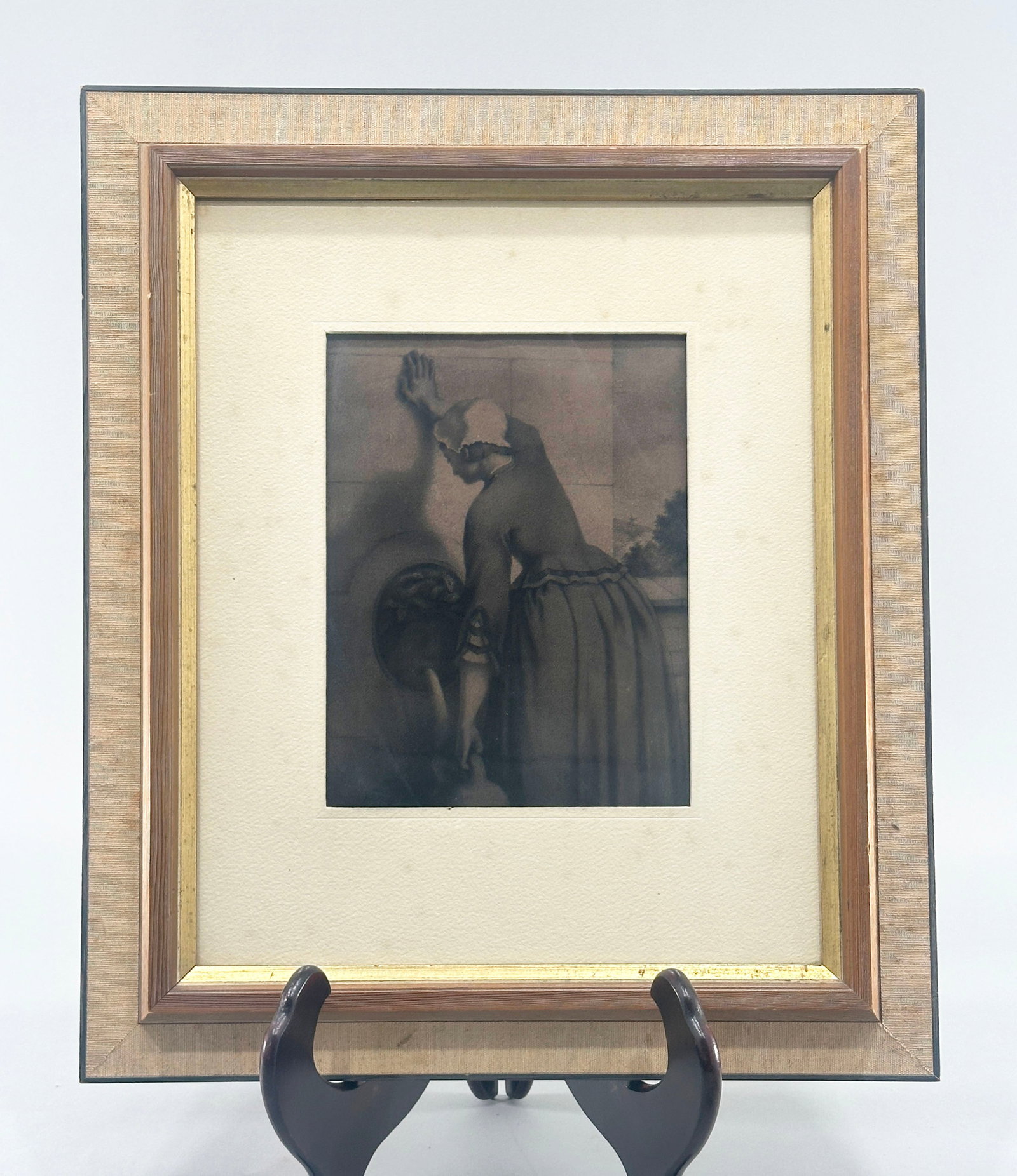 Reproduction after William Morris Hunt, "Girl at Fountain" Lithograph: Collotype photoreproduction after William Morris Hunt's lithograph, "Girl at Fountain." Sight dimensions: 7 1/8 x 9 1/2 inches Frame dimensions: 20 1/2 x 17 1/4 inches.