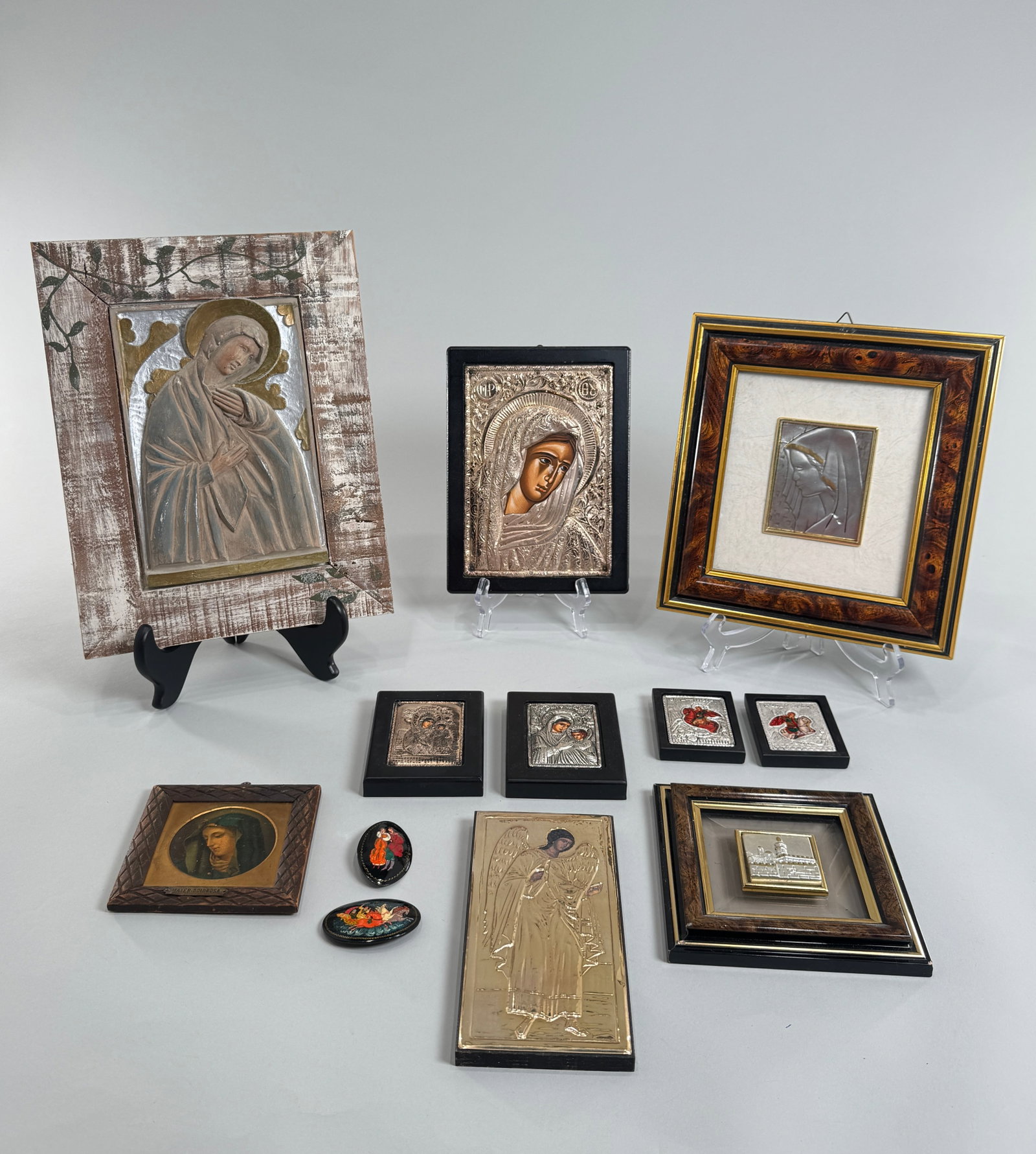 Collection of Religious Icons and Small Framed Art: A collection of religious icons and small framed artworks. The largest item measures approximately 12 3/4 inches. The total weight of the collection is approximately 4 lbs. Items include various