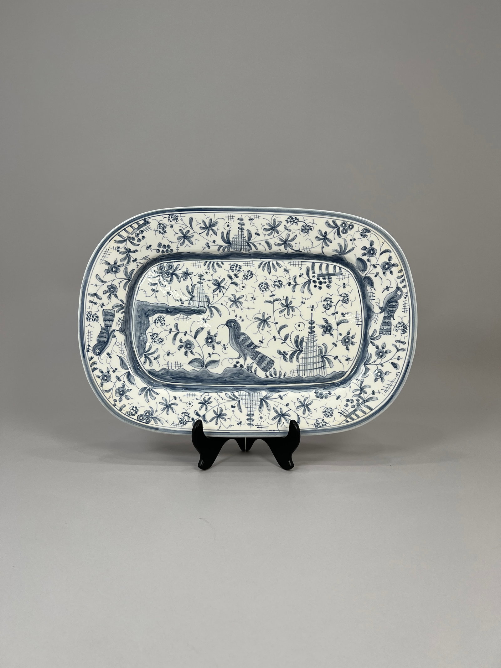 Nazari Portugal Hand-Painted Ceramic Platter: A hand-painted ceramic platter/charger featuring a blue bird and floral motif. Signed "Nazari - Hand Painted - Made in Portugal - Casa Fina" on the reverse. Weight: 5lb 14oz. 
