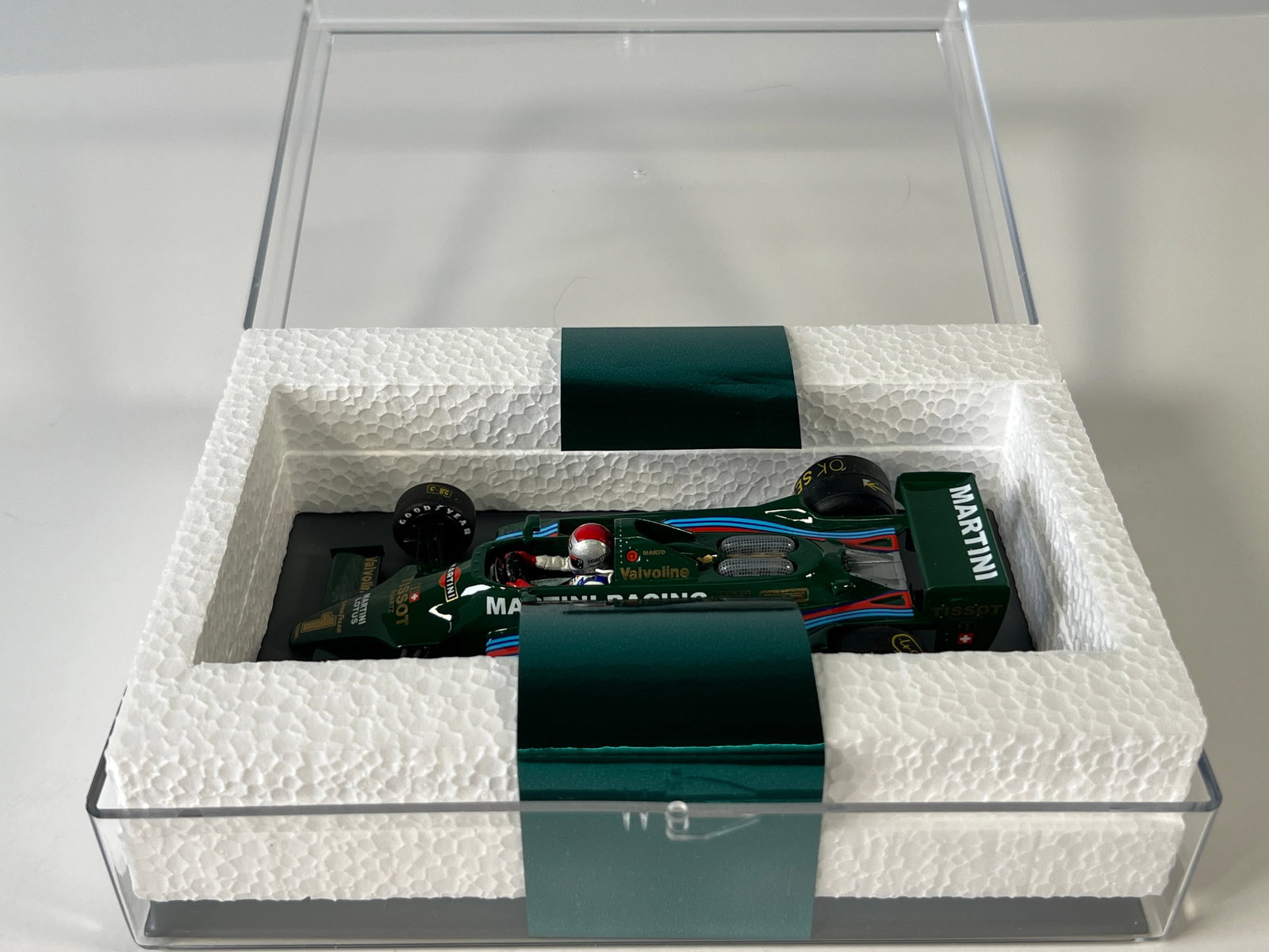Ostorero Lotus 79 #1 Martini Racing 1/32 Slot Car: Ostorero F1 Lotus 79 #1 Martini Racing 1/32 Slot Car, with original case. Mario Andretti. Case measures 7.5 inches in length and weighs 15 oz.
