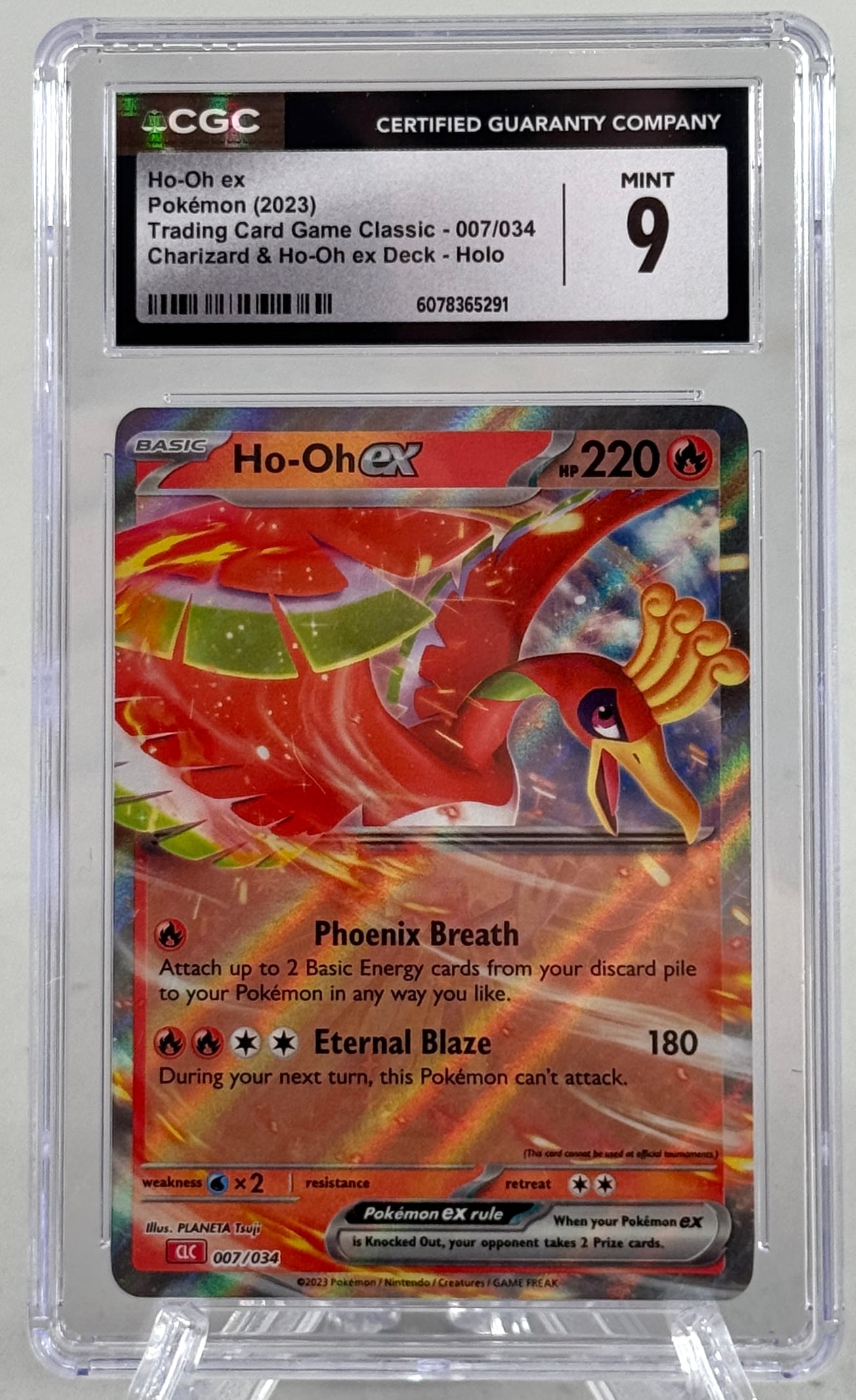 Ho-Oh ex Pokemon Card CGC 9 Mint: Ho-Oh ex Pokemon card from the Trading Card Game Classic, graded CGC 9 Mint. Dimensions approximately 10 x 7.6 cm.