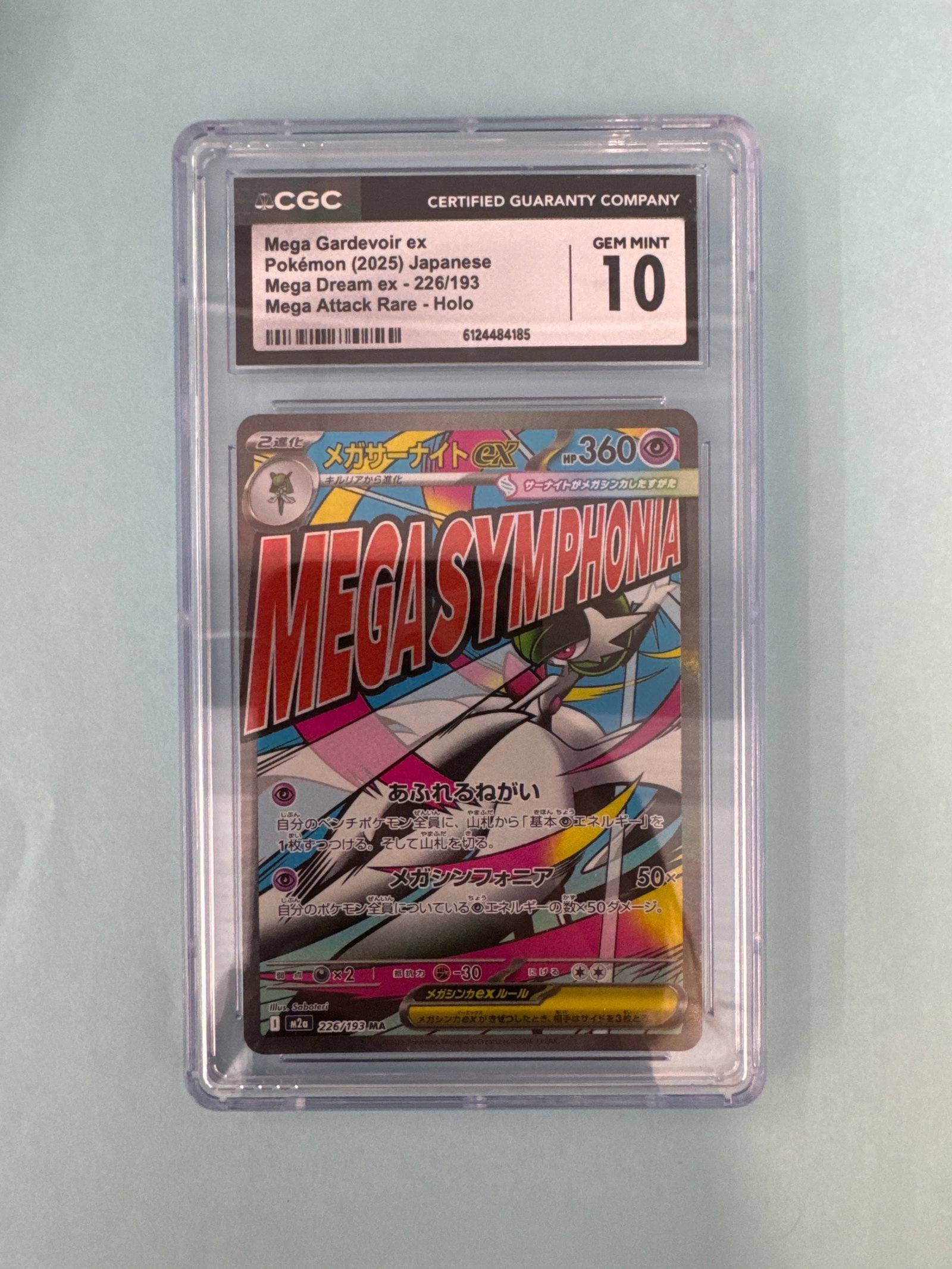 CGC 10 Gem Mint Mega Gardevoir EX Pokemon Card: CGC graded Gem Mint 10 Mega Gardevoir EX Pokemon card. Card is encapsulated in a protective case. Size: 12 x 7.9cm approx. Weight: 2oz. 