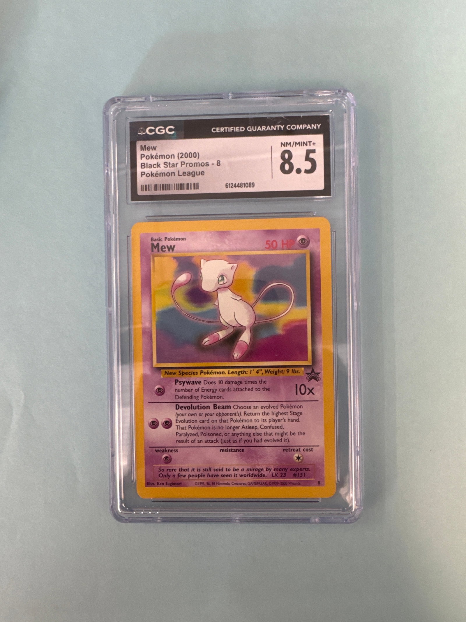 CGC 8.5 Mew Pokemon Black Star Promo #8 (2000): CGC graded NM/Mint+ 8.5 Mew Pokemon card from the Black Star Promos series, card #8, released in 2000. Weight: 2oz. Size: 13.5 x 8 cm approx. 