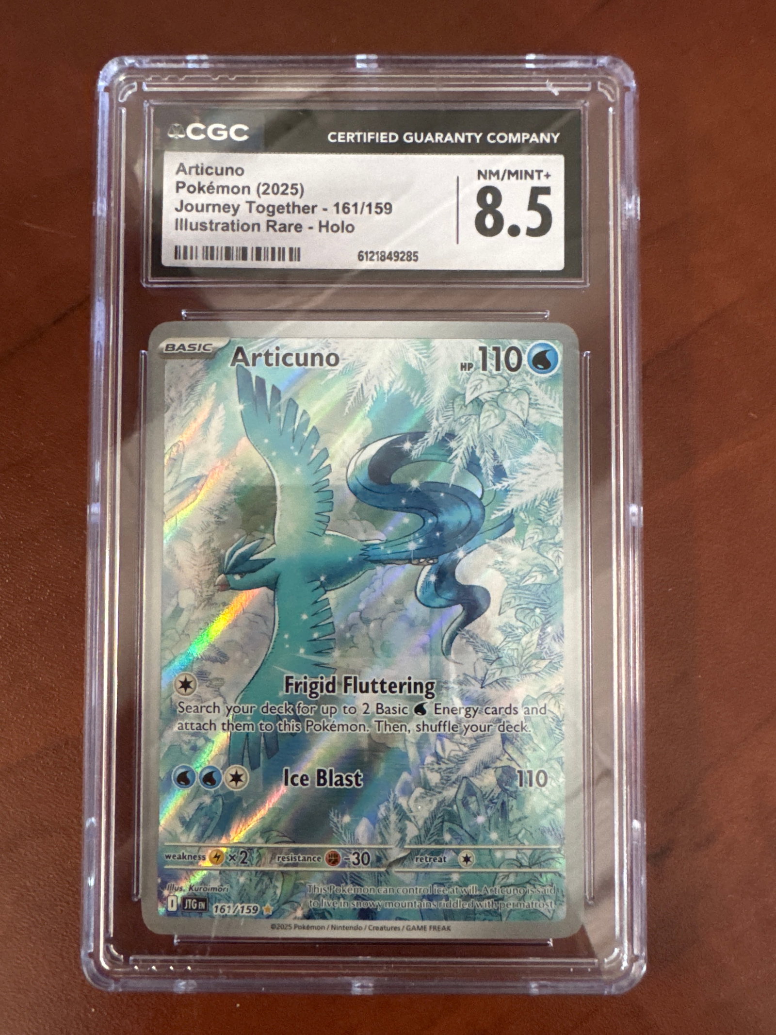 Articuno Pokemon Card CGC 8.5: Articuno Pokemon card, Journey Together Illustration Rare, Holo. Graded 8.5 NM/MINT+ by CGC. Weight: 1.8oz. Size: 13.5 x 8 cm approx. 