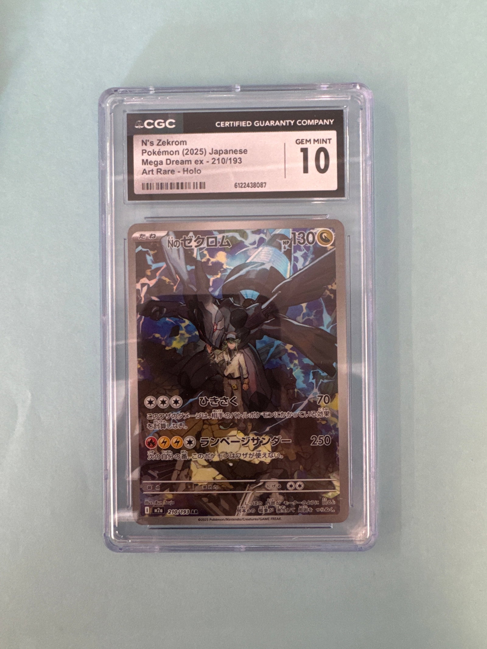 N's Zekrom (2025) Japanese Mega Dream EX - 210/193 CGC 10: Graded CGC Gem Mint 10. N's Zekrom (2025) Japanese Mega Dream EX - 210/193. Features a holo design. Weight: 2oz. Size: 13.5 x 8 cm approx. 