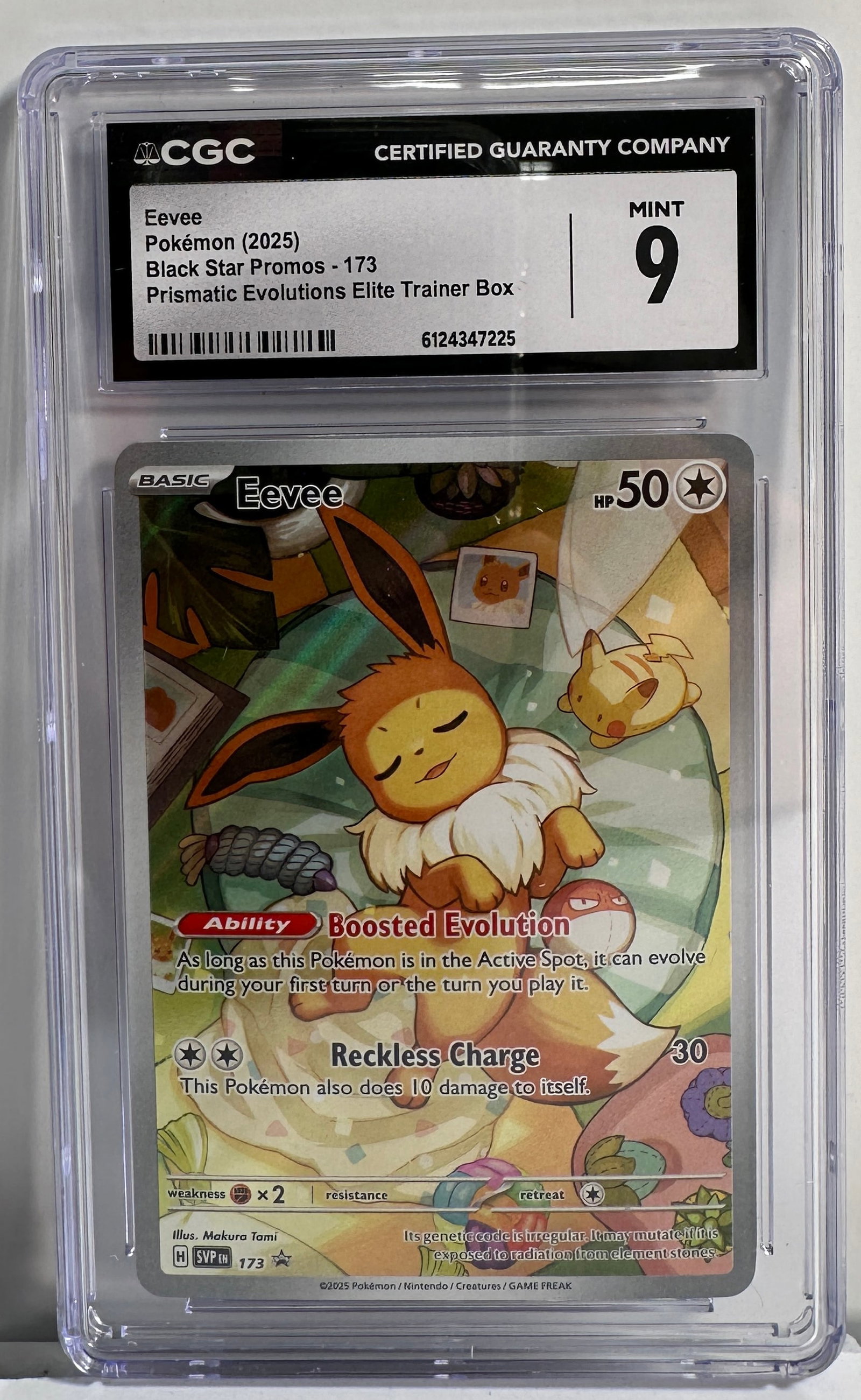 CGC Graded Mint 9 Eevee Pokemon Card - Black Star Promos - Prismatic Evolutions Elite Trainer Box: A graded CGC Mint 9 Eevee Pokemon card from the Black Star Promos series, specifically from the Prismatic Evolutions Elite Trainer Box. Size: 5'' x 3''. 