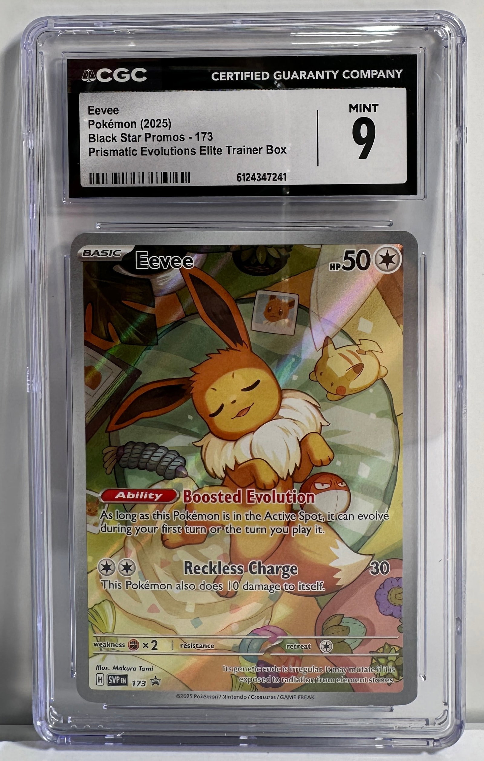 CGC Graded Eevee Pokemon Card - Mint 9: CGC graded Eevee Pokemon card. Pokemon (2025) Black Star Promos - 173 Prismatic Evolutions Elite Trainer Box. Grade Mint 9. Size: 5'' x 3''. 