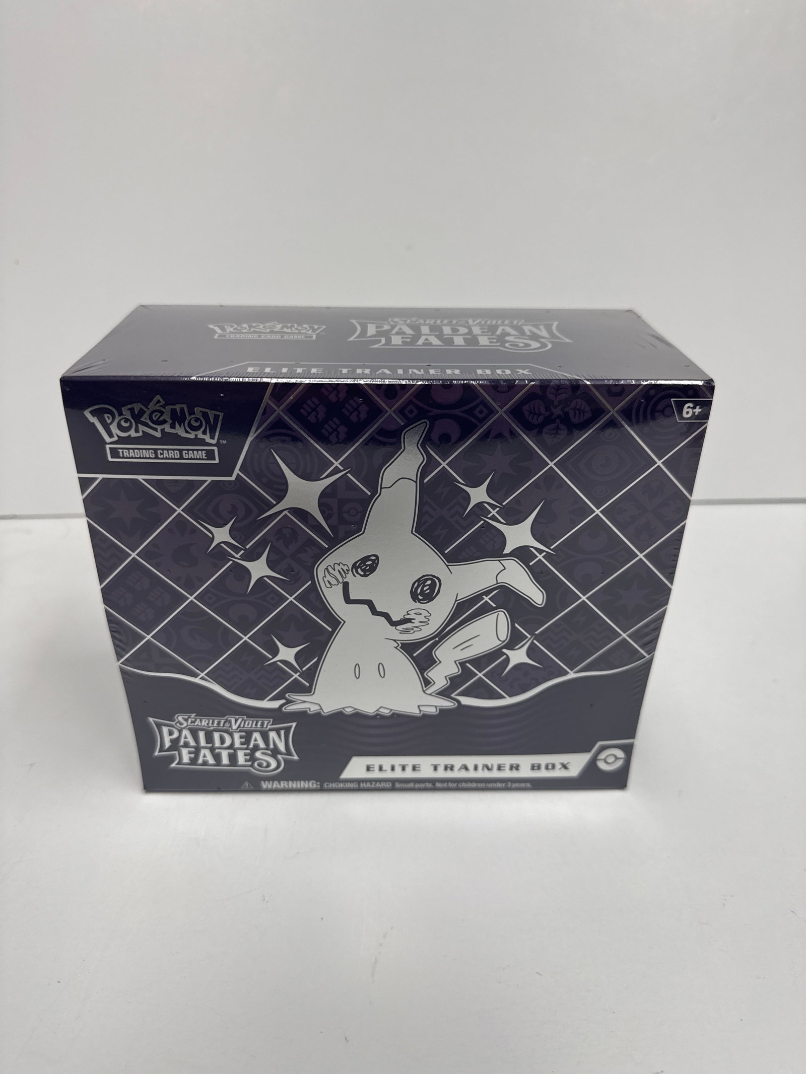 Pokemon Scarlet & Violet Paldean Fates Elite Trainer Box: Sealed Pokemon Scarlet & Violet Paldean Fates Elite Trainer Box. Features Shiny Mimikyu on the packaging. Includes 9 booster packs, a full-art promo card, energy cards, sleeves, dice, and more.
