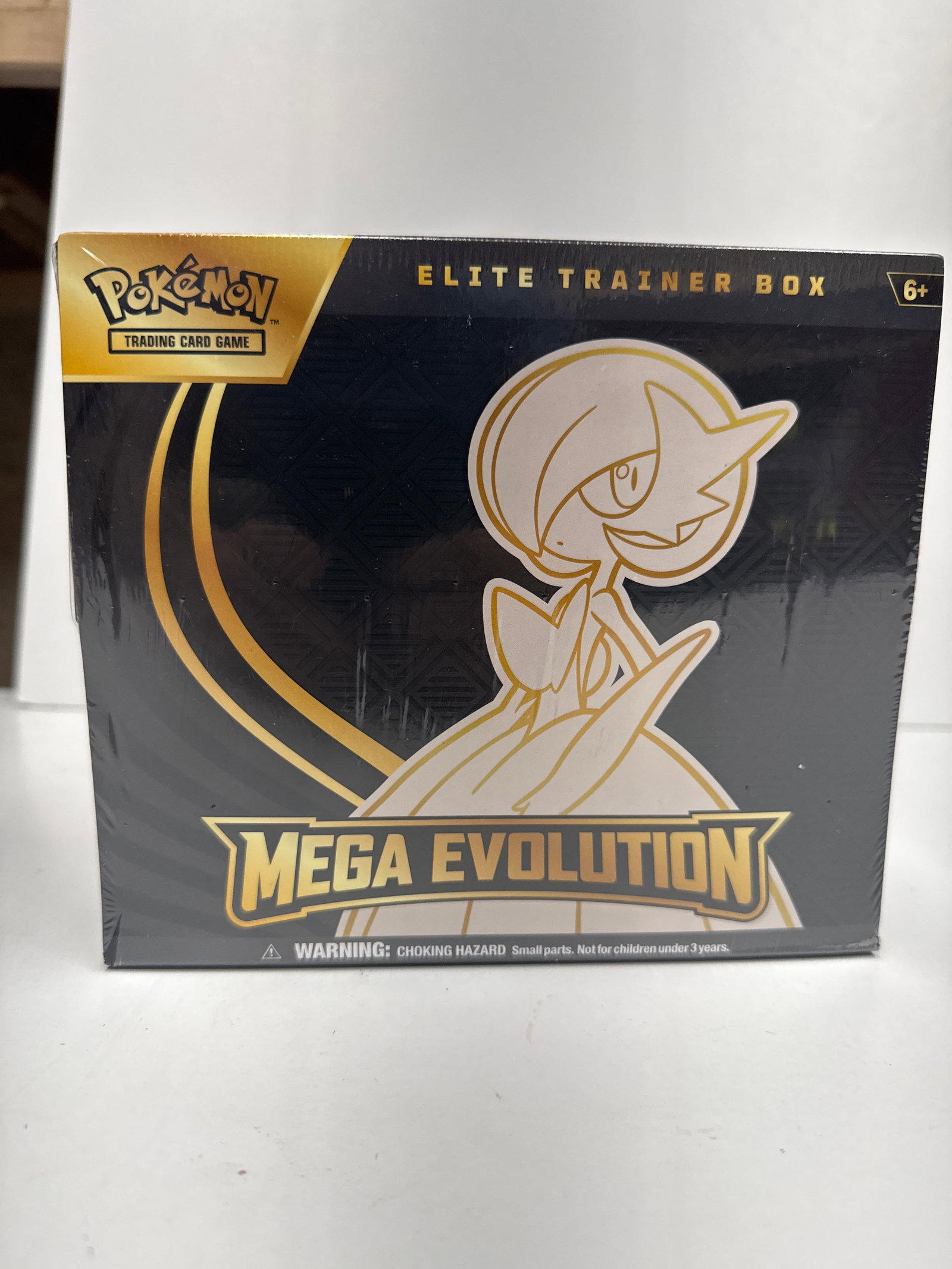 Pokemon Trading Card Game: Mega Evolution Elite Trainer Box: Sealed Pokemon TCG: Mega Evolution Elite Trainer Box. Includes 9 booster packs, energy cards, player's guide, and more. Features Alakazam ex. Box has minor damage to the plastic wrap.