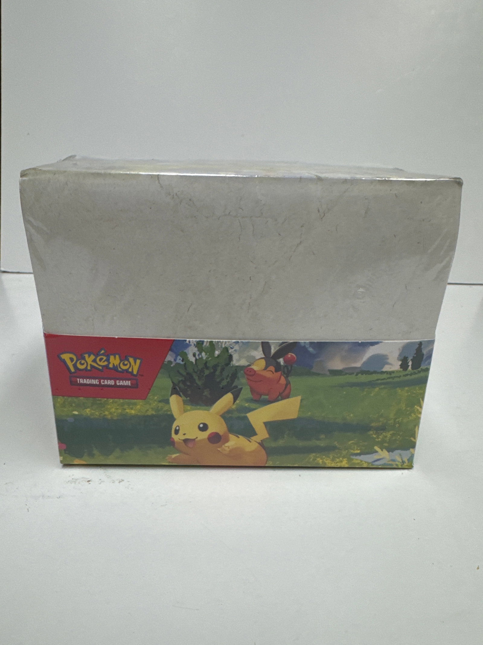 Pokemon Trading Card Game Ascended Heroes Mini Tin Display: Sealed Pokemon Trading Card Game Scarlet & Violet Elite Trainer Box. Features various Pokemon characters and artwork. Includes 12 booster packs, energy cards, and more.