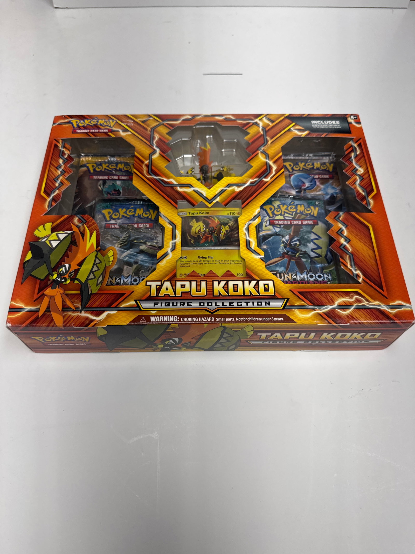 Pokemon Tapu Koko Figure Collection Box: This Pokemon Trading Card Game Tapu Koko Figure Collection Box includes 4 booster packs, 1 foil promo card featuring Tapu Koko, 1 sculpted figure of Tapu Koko, and 1 code card for the Pokemon TCG Onli