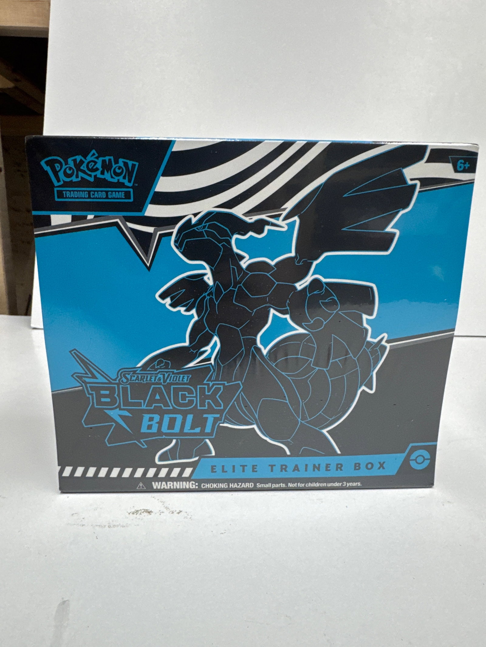 Pokemon TCG Scarlet & Violet - Black Bolt Elite Trainer Box: Sealed Pokemon Trading Card Game Elite Trainer Box featuring the Scarlet & Violet - Black Bolt expansion. Includes 9 booster packs, 65 card sleeves, damage counter dice, and more.