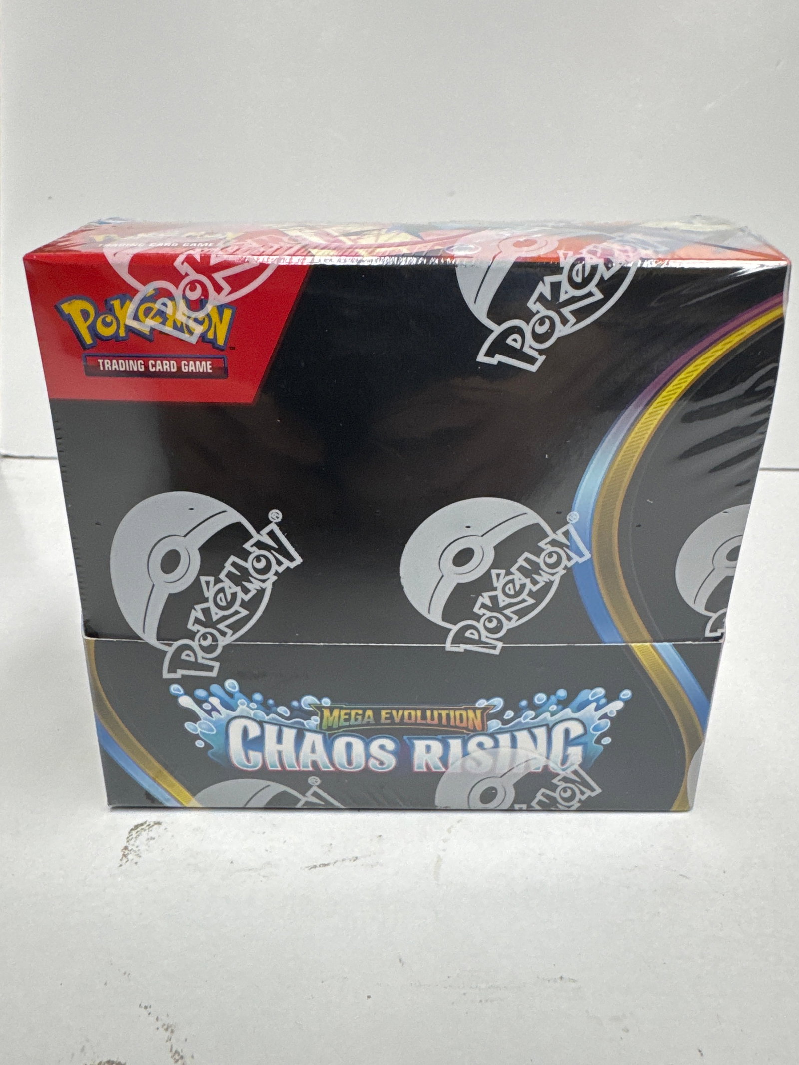 Pokemon TCG: Mega Evolution Chaos Rising Booster Box: Sealed Pokemon Trading Card Game booster box featuring the Mega Evolution Chaos Rising expansion. This box contains multiple booster packs, promising exciting new cards and gameplay.
