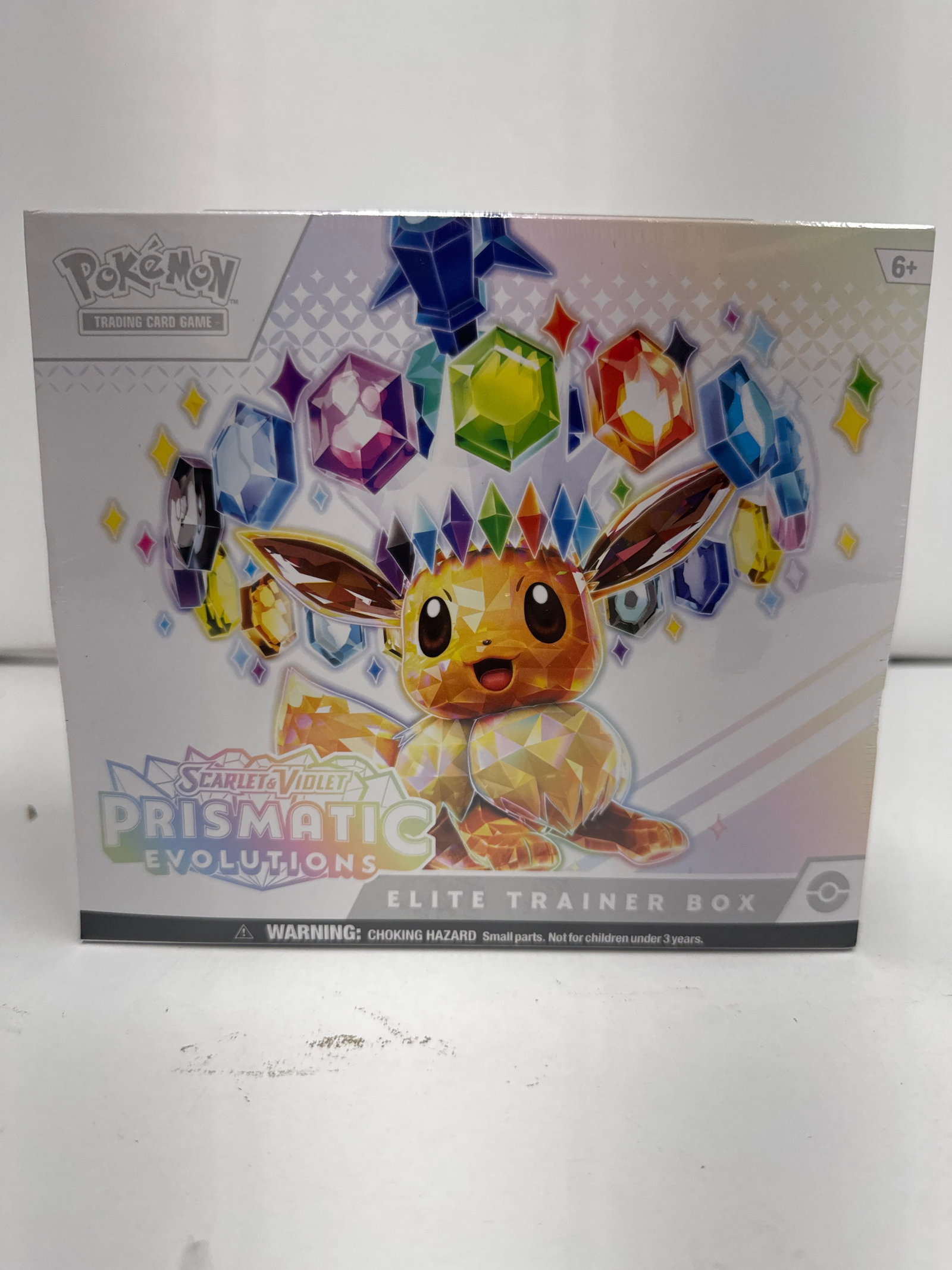 Pokemon Scarlet & Violet Prismatic Evolutions Elite Trainer Box: Sealed Pokemon Scarlet & Violet Prismatic Evolutions Elite Trainer Box. This box contains 9 booster packs from the Scarlet & Violetâ€”Prismatic Evolutions expansion, featuring Eevee and it