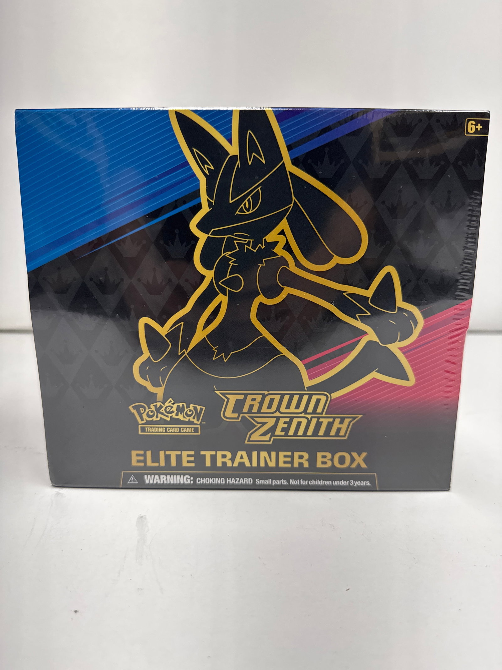 Pokemon TCG: Crown Zenith Elite Trainer Box: Sealed Pokemon TCG: Crown Zenith Elite Trainer Box. Features Lucario on the cover. Includes 10 booster packs, 65 card sleeves, 45 energy cards, dice, markers, and a code card.