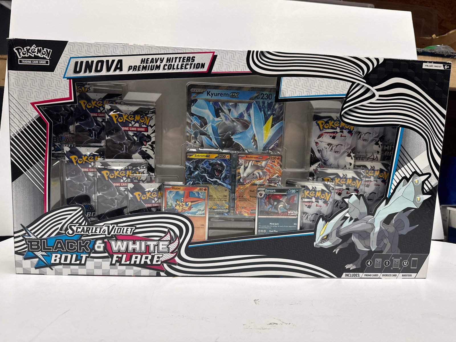 Pokemon TCG Unova Heavy Hitters Premium Collection Box: This Pokemon TCG Unova Heavy Hitters Premium Collection Box features a Kyurem EX promo card, four foil promo cards featuring Zekrom EX, Reshiram EX, Victini, & Zoroark, six Pokemon