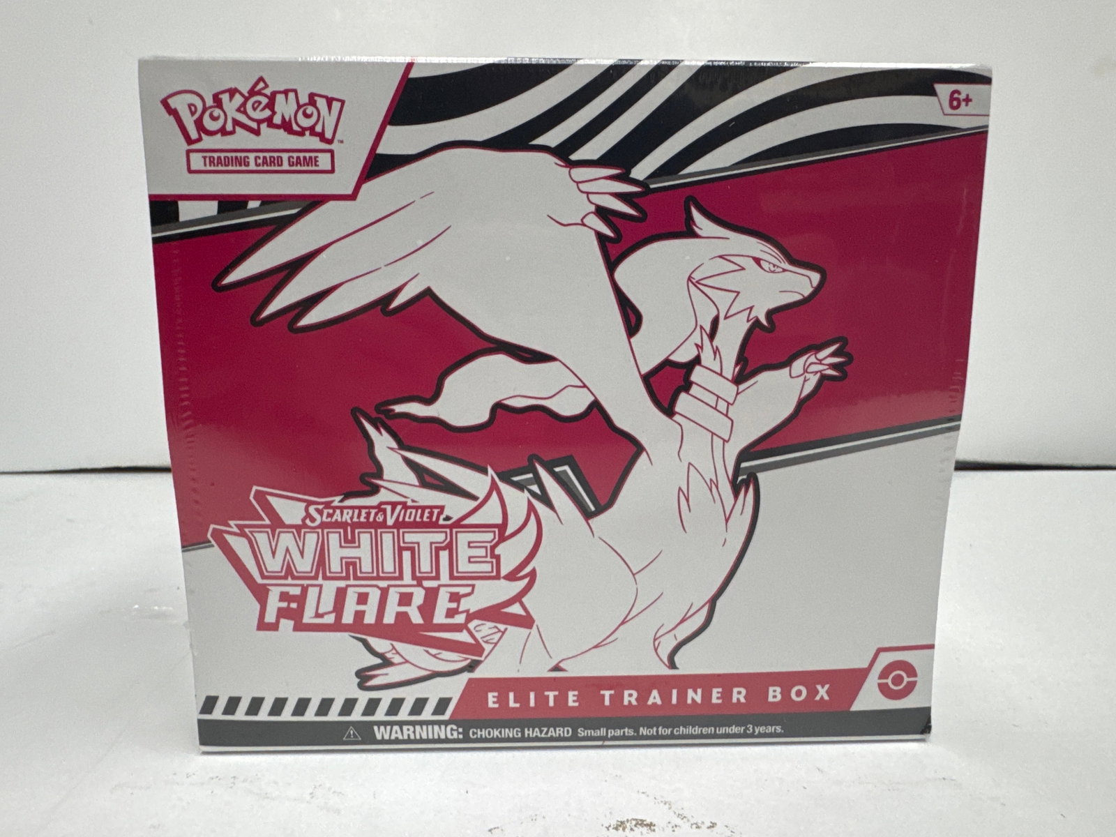 Pokemon Scarlet & Violet White Flare Elite Trainer Box: Sealed Pokemon Scarlet & Violet White Flare Elite Trainer Box. Contains 9 booster packs, full-art promo cards, 65 card sleeves, 45 Pokemon TCG Energy cards, a player's guide, dice, markers, and a code