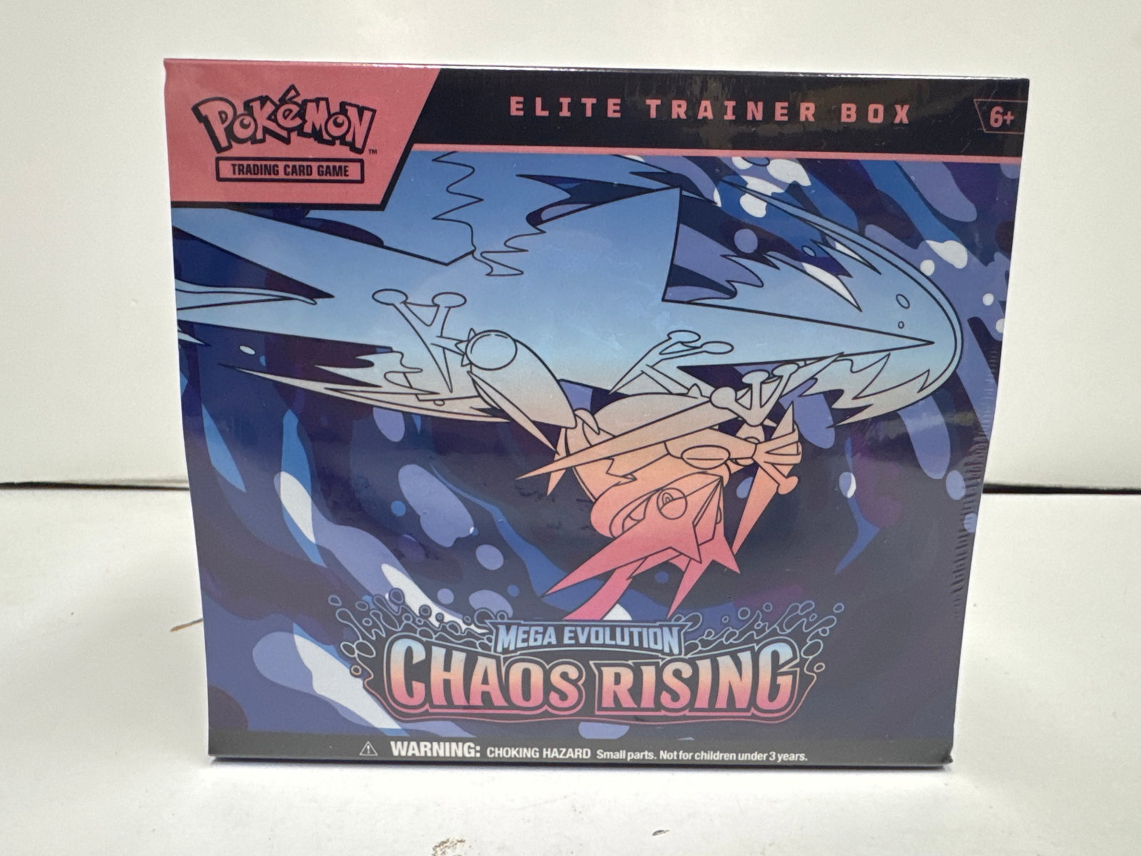 Pokemon TCG: Mega Evolution Chaos Rising Elite Trainer Box: Sealed Pokemon Trading Card Game Elite Trainer Box for the Mega Evolution Chaos Rising expansion. Includes 10 booster packs, Fennekin promo card, sleeves, dice, and more.