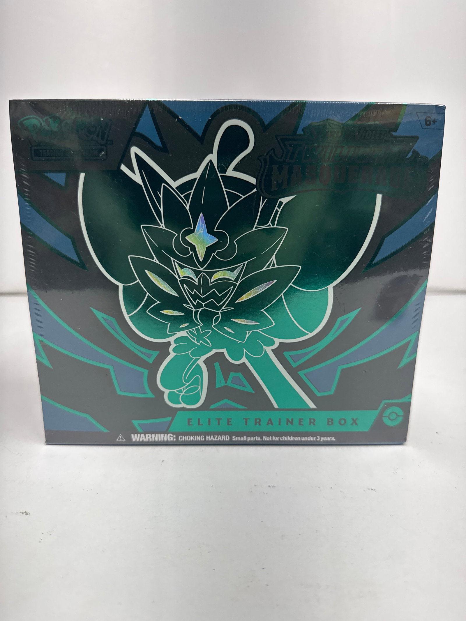 Pokemon Scarlet & Violet - Twilight Masquerade Elite Trainer Box: Sealed Elite Trainer Box for the Pokemon TCG Scarlet & Violetâ€”Twilight Masquerade expansion. Features 11 Scarlet & Violetâ€”Twilight Masquerade booster packs, a full-art prom