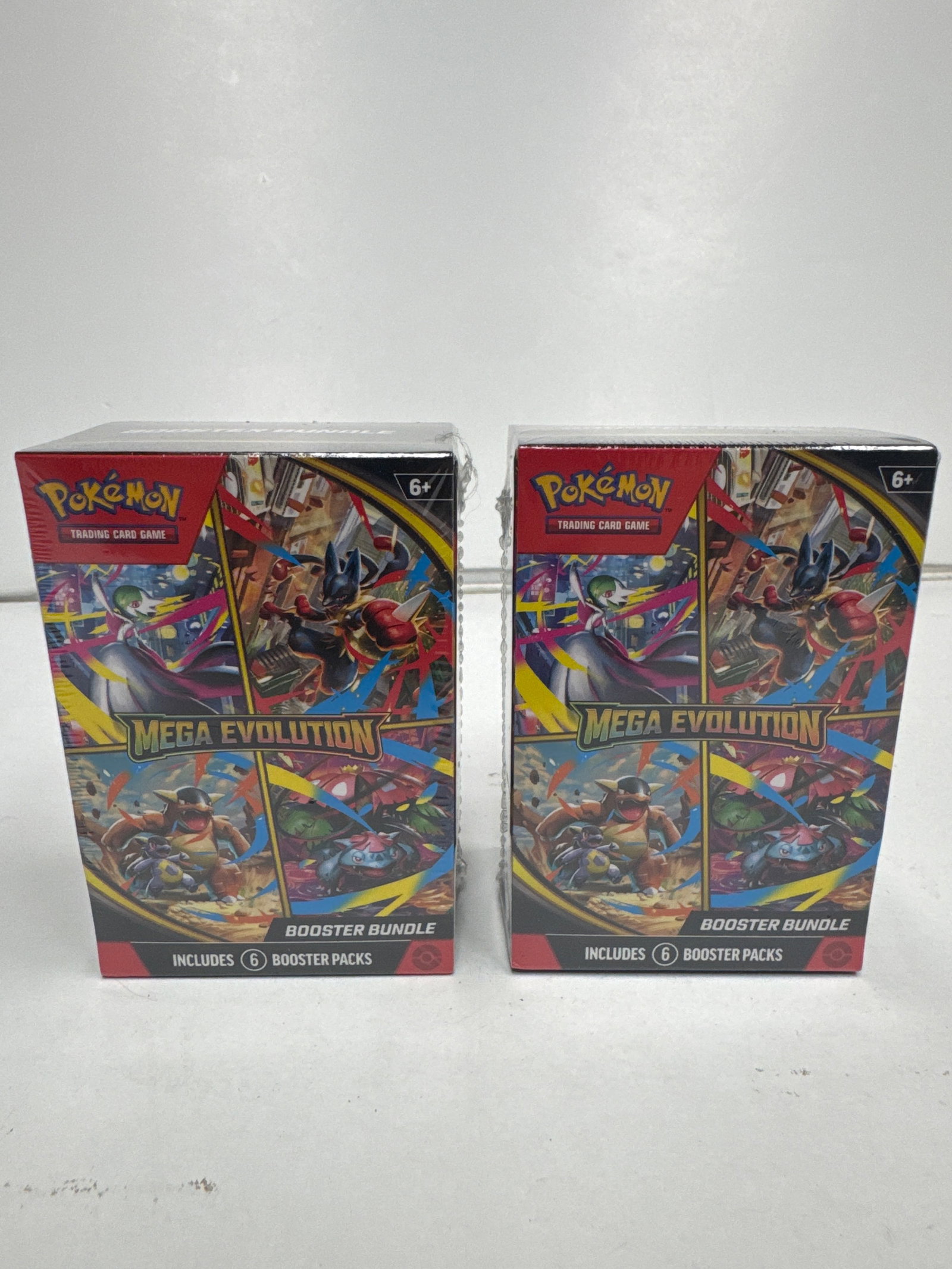 Pokemon TCG Mega Evolution Booster Bundle (2 Packs): Two sealed Pokemon TCG Mega Evolution Booster Bundles. Each bundle contains six booster packs, featuring over 180 cards and powerful Mega Evolution Pokemon. Expand your collection and prepare for