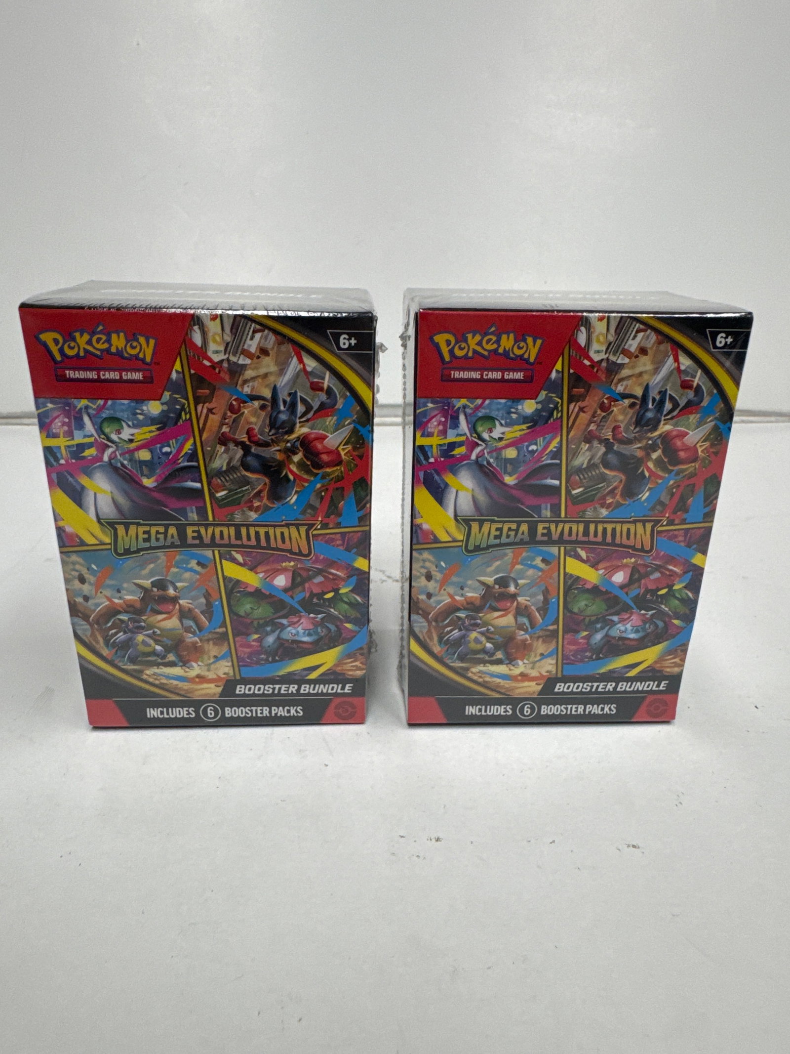Pokemon TCG Mega Evolution Booster Bundle (2 Packs): Two sealed Pokemon TCG Mega Evolution Booster Bundles. Each bundle contains 6 booster packs, with each pack containing 10 cards and 1 Basic Energy or Pokemon TCG Live code card. Expand your