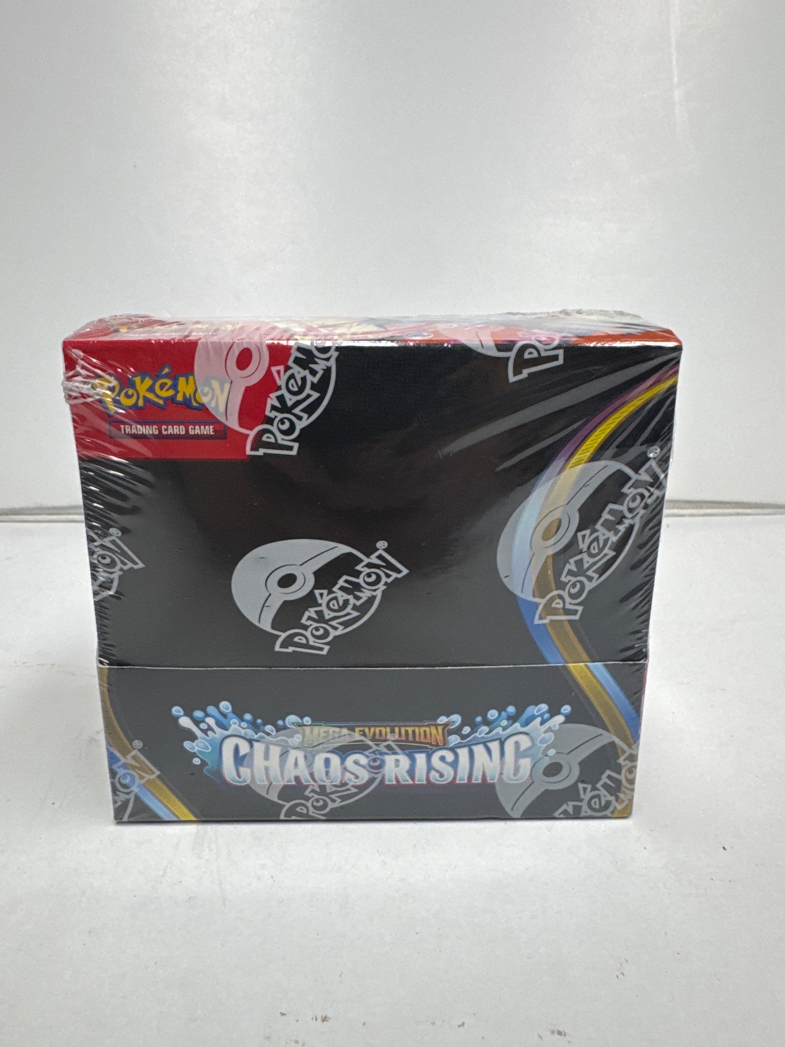 Pokemon TCG: Sword & Shield - Chaos Rising Booster Box: Sealed Pokemon Trading Card Game booster box from the Sword & Shield - Chaos Rising expansion. Features artwork from the set, including Mega Evolution Pokemon.
