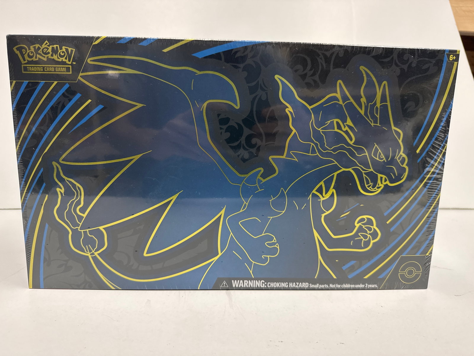 Pokemon Trading Card Game Mega Charizard EX Ultra-Premium Collection Box: This Ultra-Premium Collection box features the powerful Mega Charizard EX from the Pokemon Trading Card Game. It includes a full-art promo card, a Mega Charizard EX playmat, a deck box, metal coin, an