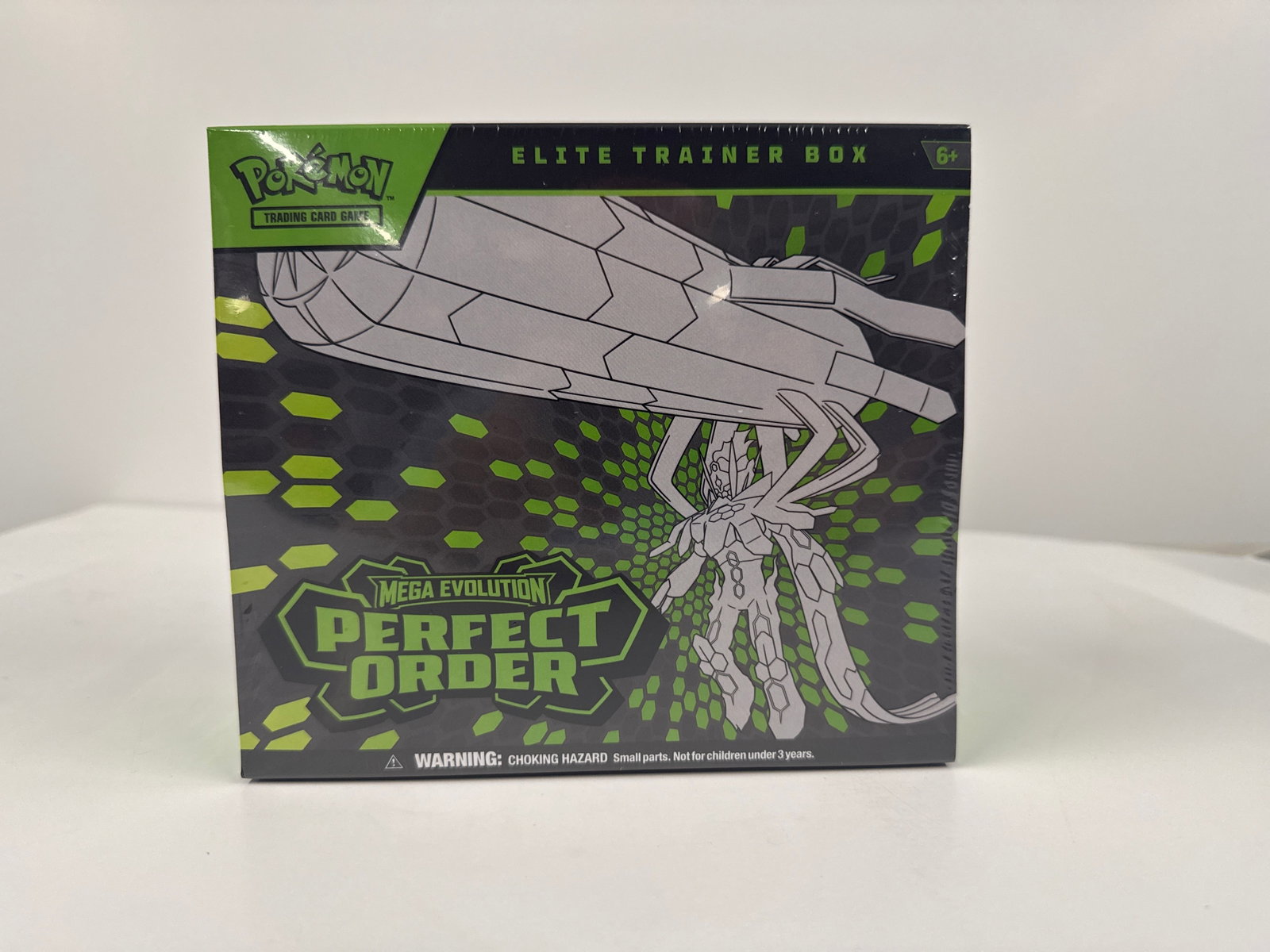 Pokemon Trading Card Game Mega Evolution Perfect Order Elite Trainer Box: This Pokemon TCG Elite Trainer Box features the Mega Evolution Perfect Order expansion. It includes 9 booster packs, 1 foil promo card, 65 card sleeves, 40 TCG energy cards, a player's guide, and vari