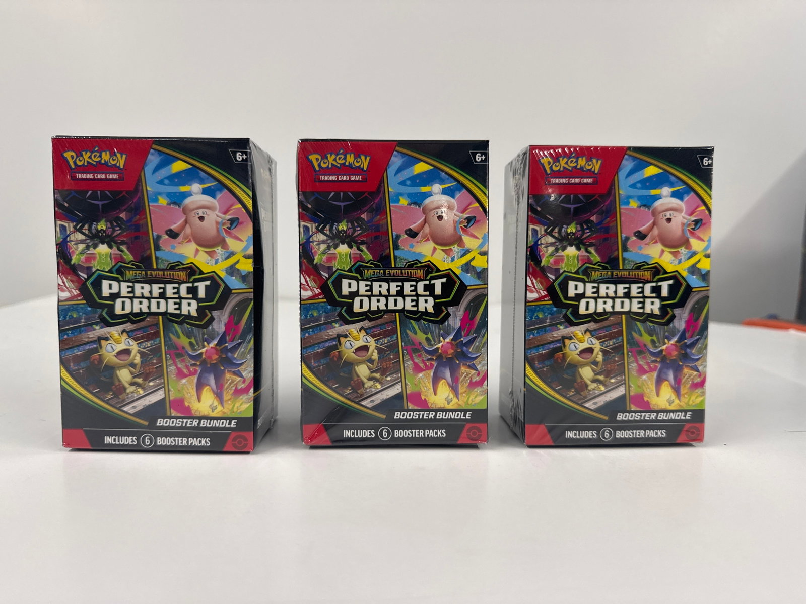 Pokemon TCG: Mega Evolution Perfect Order Booster Bundle (3 Boxes): Three sealed booster bundles for the Pokemon Trading Card Game, featuring the Mega Evolution: Perfect Order expansion. Each bundle contains 6 booster packs, offering a chance to expand your collection