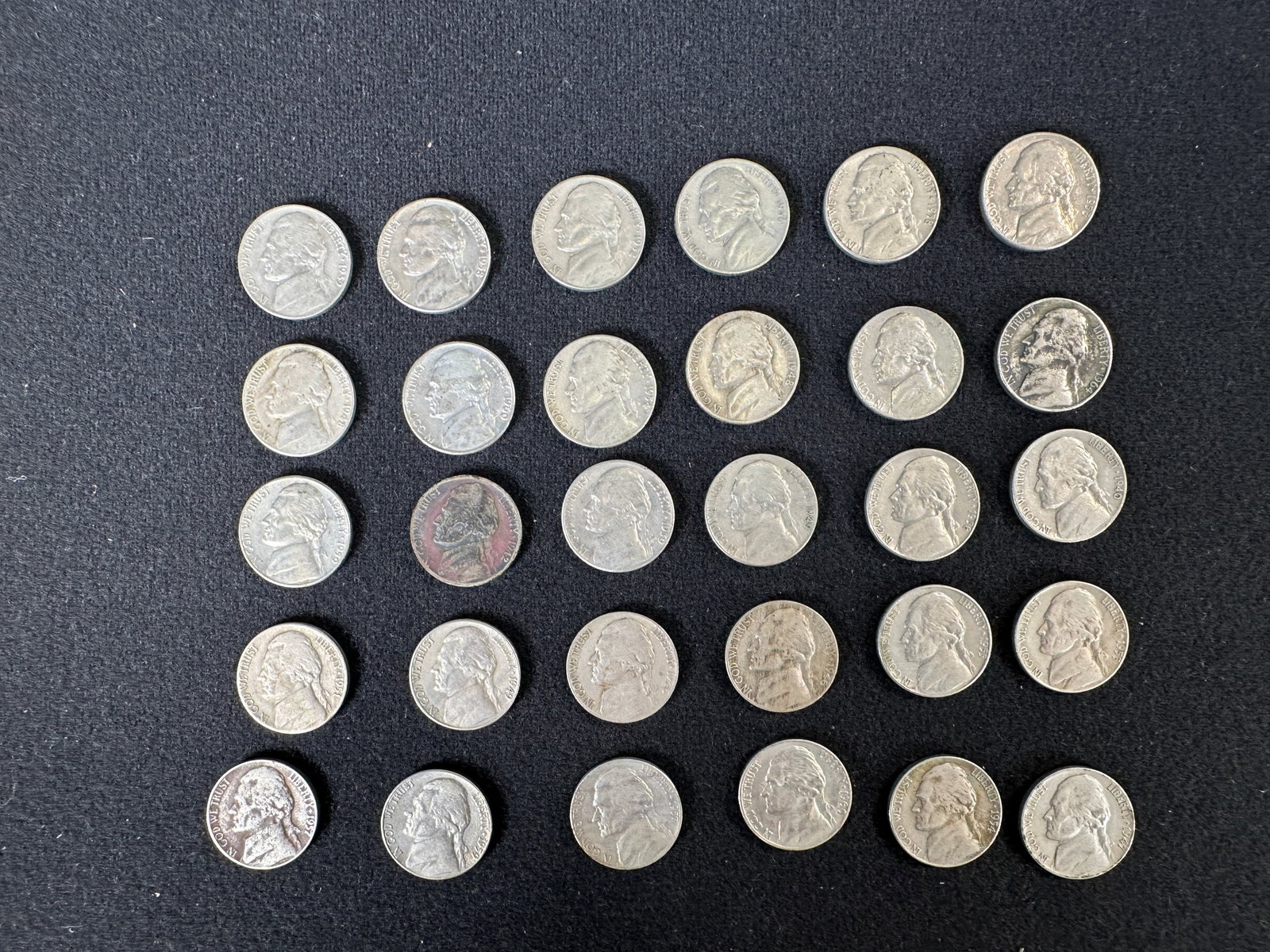 Jefferson Nickels - Lot of 30 Coins: Collection of 30 Jefferson nickels. Dates and mint marks vary. Circulated condition.