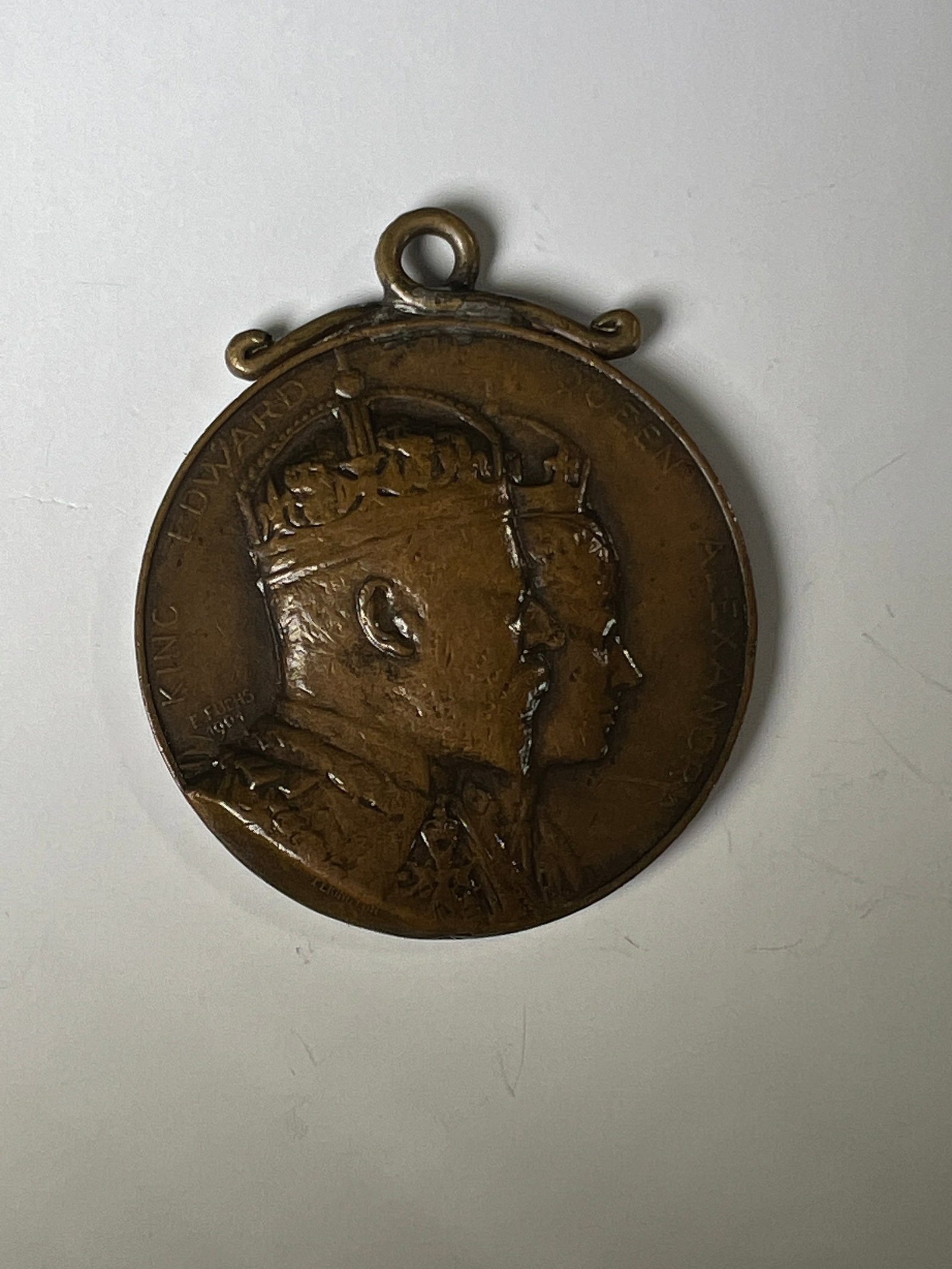 1901 King Edward VII & Queen Alexandra Bronze Medal: 1901 King Edward VII and Queen Alexandra bronze medal with loop for wear. Features portraits of the King and Queen on one side and allegorical figures on the other.