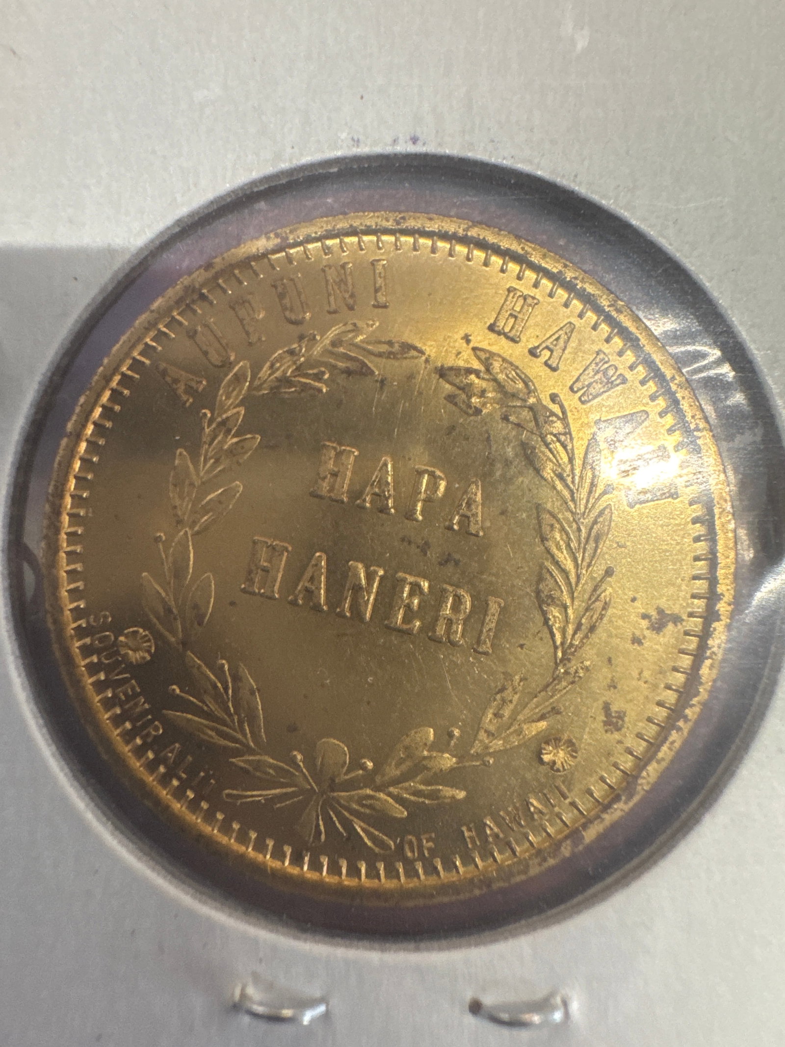 1847 Kamehameha Hawaii 1 Cent: This is a souvenir coin from Hawaii, dated 1847. The obverse features a portrait of King Kamehameha III, and the reverse displays the inscription "HAPA HANERI" within a wreath.