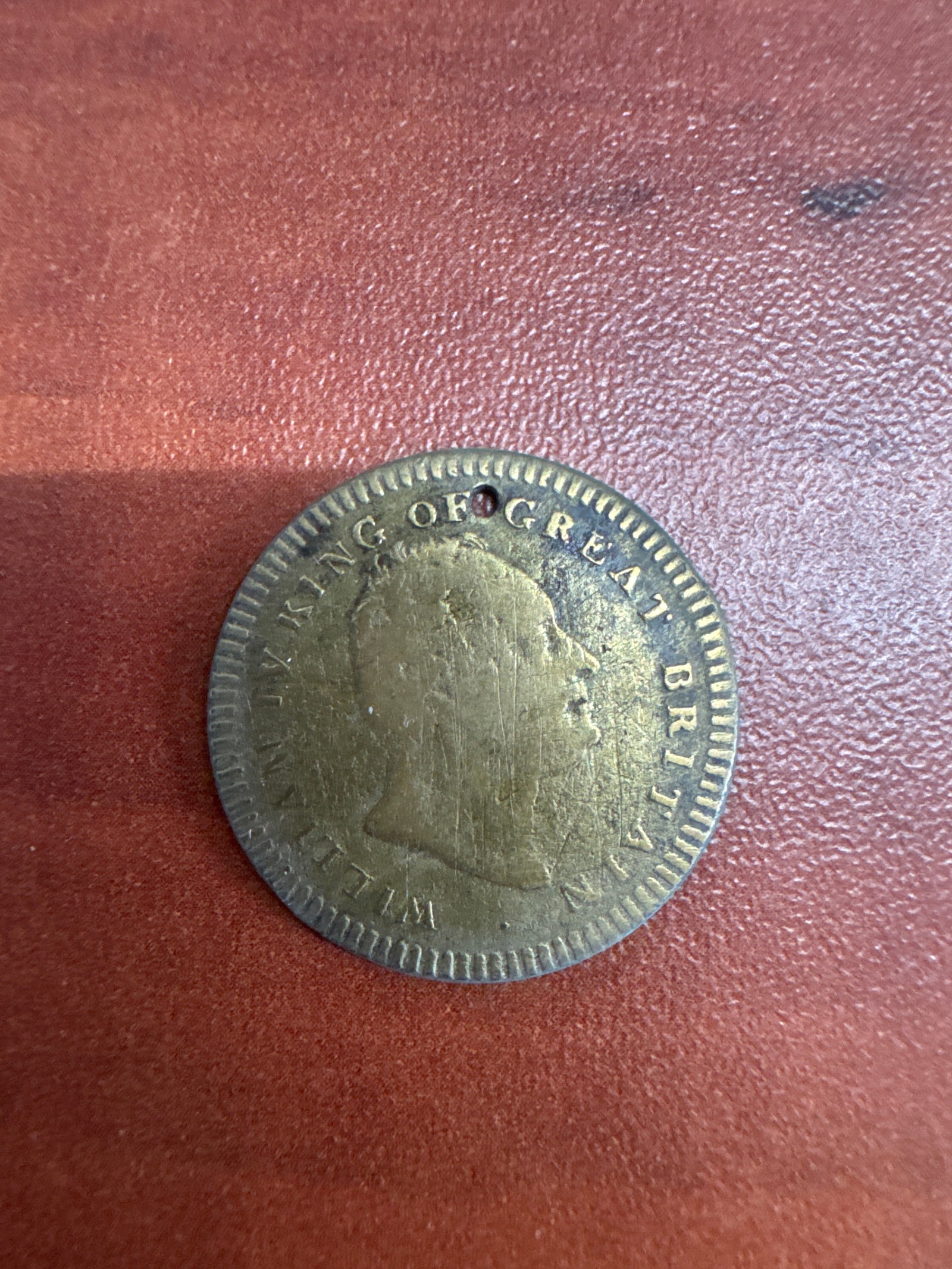 Commemorative Coin for William IV, King of Great Britain, Died June 20, 1837: This is a commemorative coin featuring a profile of William IV, King of Great Britain, on one side. The reverse side depicts a weeping willow tree over a tombstone, with the inscription 'BELOVED L