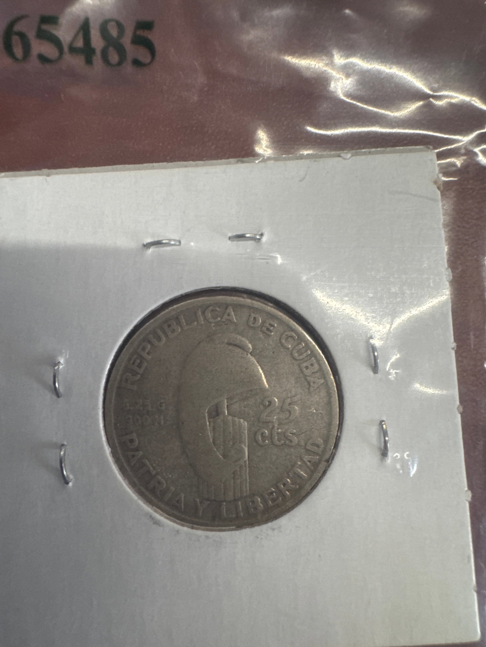 Cuba 25 Centavos Coin, 1953: A 1953 Cuban 25 centavos coin featuring Jose Marti. The coin commemorates the centennial of his birth. The reverse shows the Cuban coat of arms and the inscription 'Republica de Cuba'.