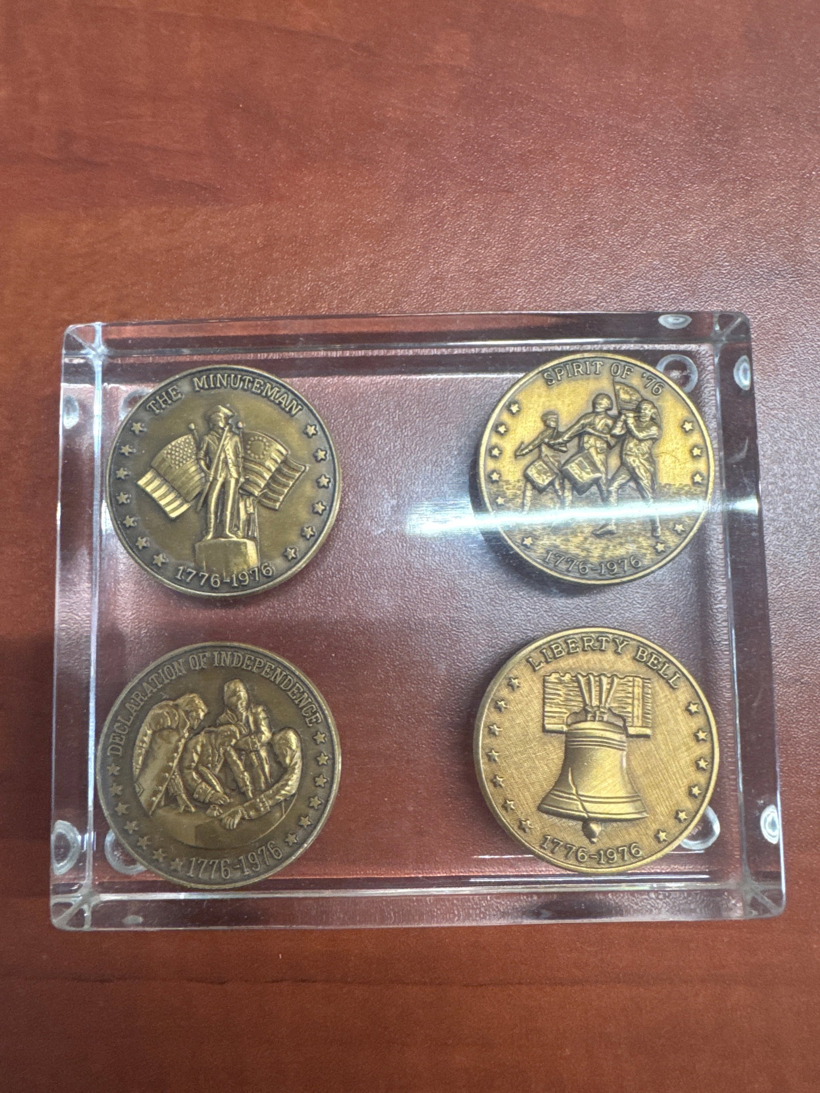 Bicentennial Commemorative Medallions - Set of 4: A set of four commemorative medallions celebrating the United States Bicentennial in 1976. The obverse designs feature "The Minuteman," "Spirit of '76," "Declaration of In
