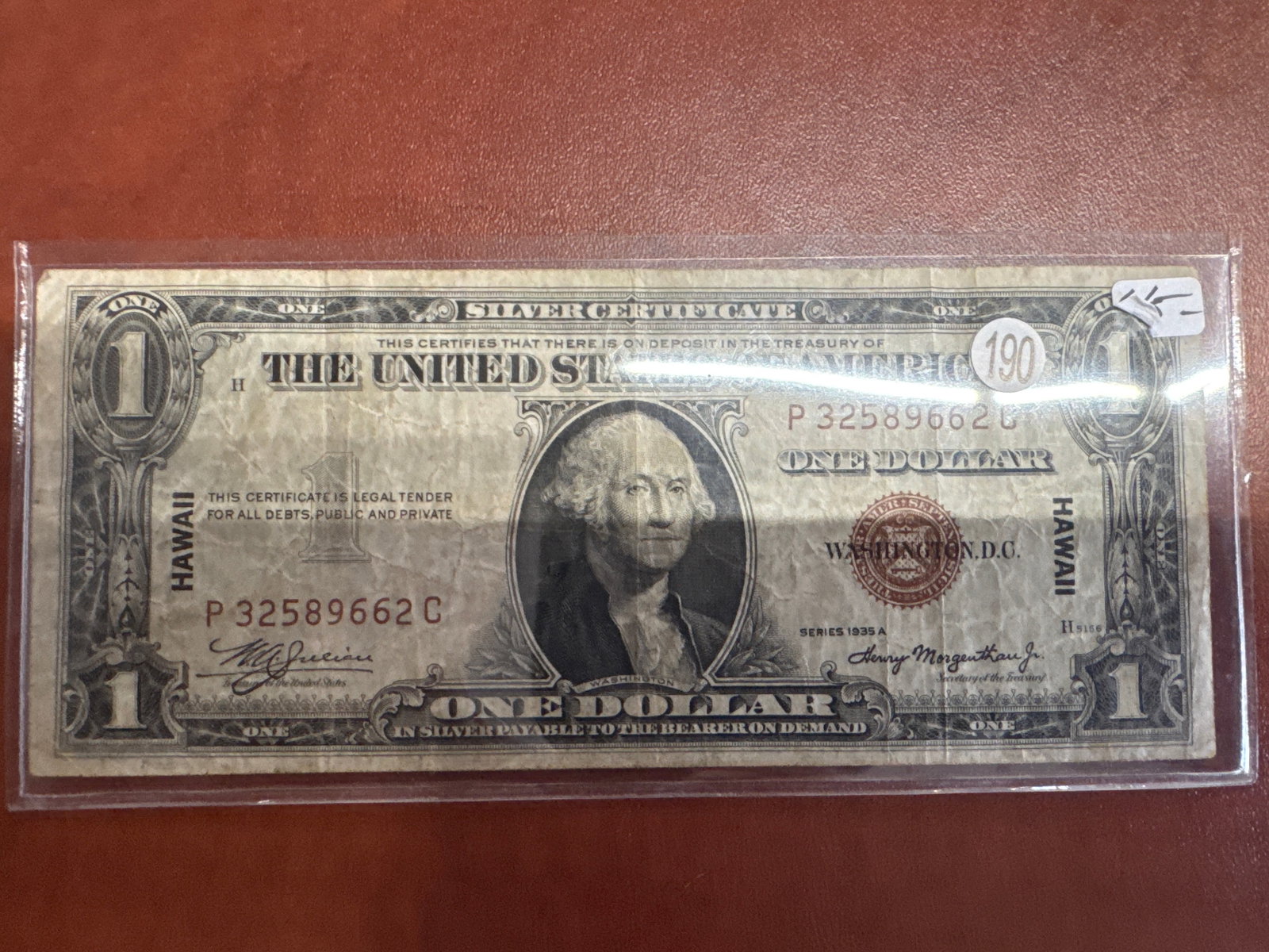 1935 A Hawaii Silver Certificate One Dollar Bill: A 1935 A Hawaii Silver Certificate, one dollar bill. This note is a legal tender for all debts, public and private. The reverse features the word "HAWAII" prominently displayed.