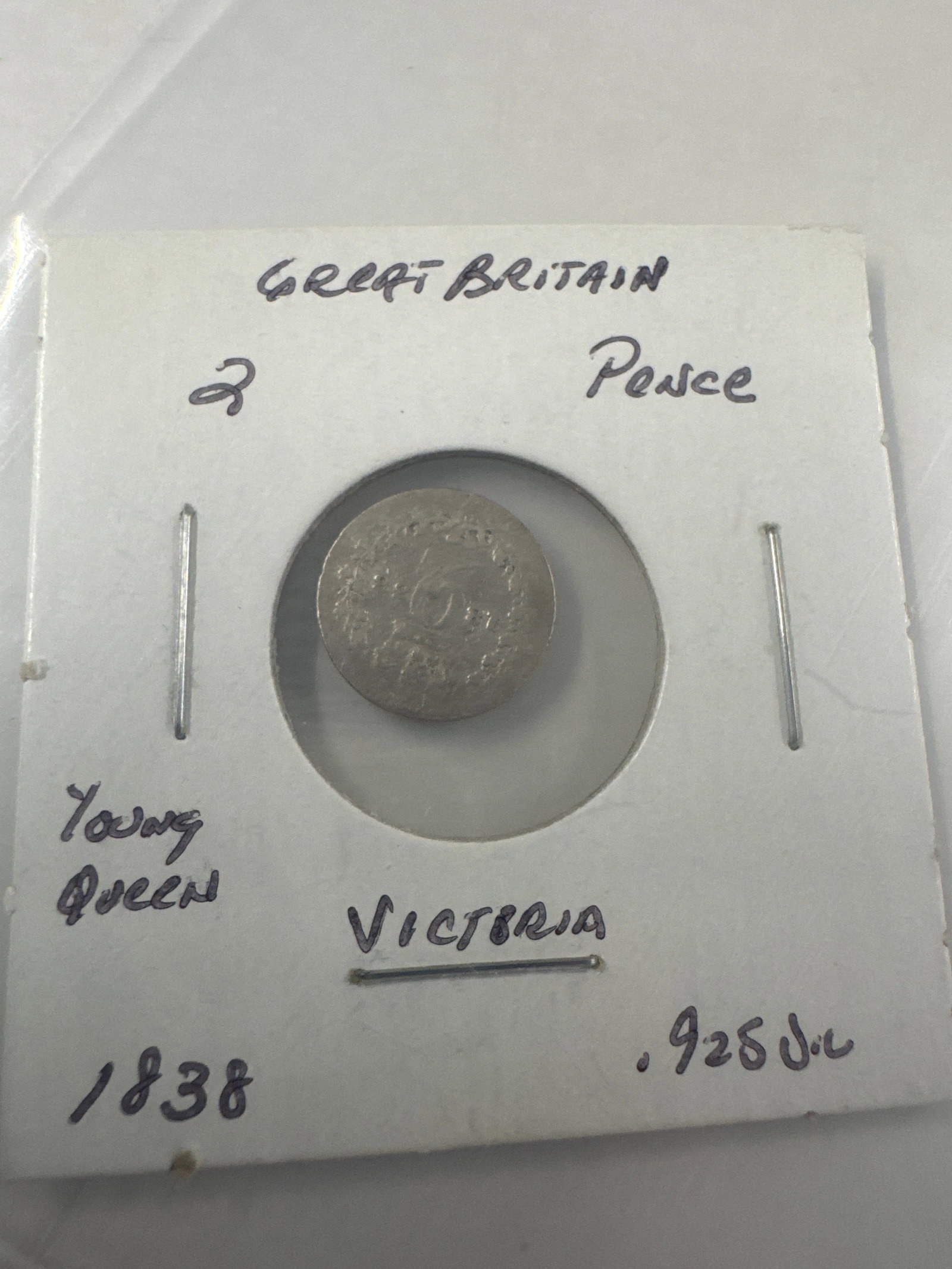 1838 Great Britain 2 Pence Young Queen Victoria Coin: A silver 2 Pence coin from Great Britain, dated 1838, featuring a young Queen Victoria. 