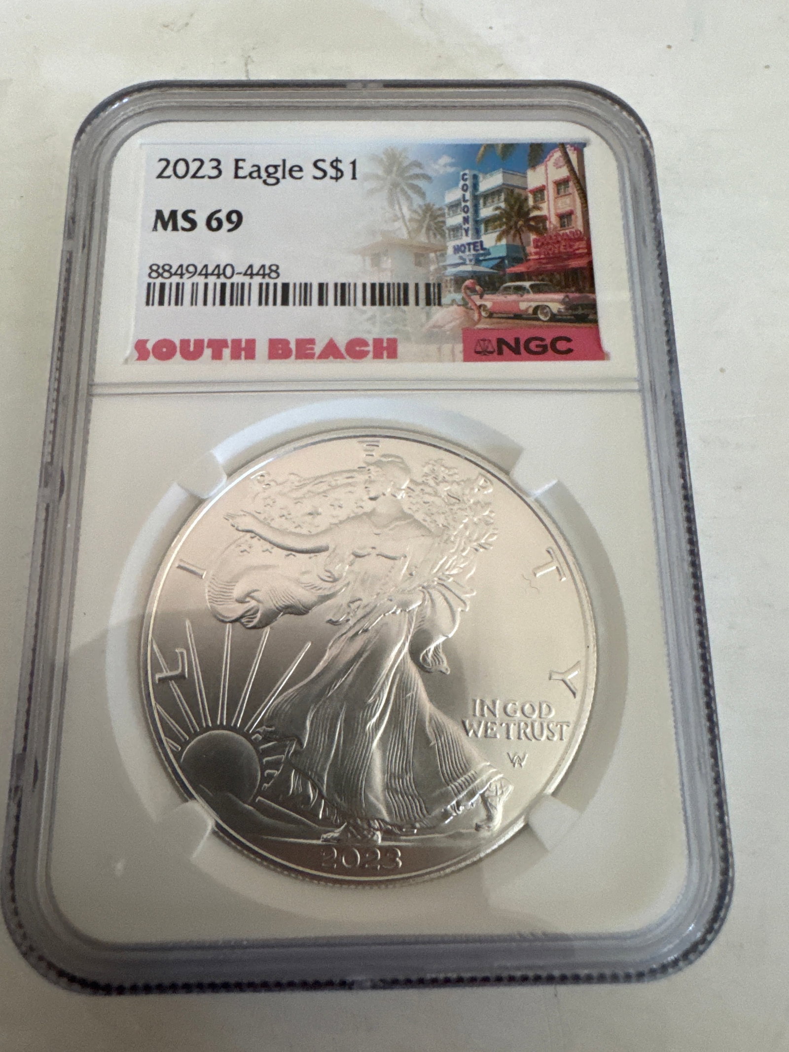 2023 American Silver Eagle $1 Coin NGC MS 69: This 2023 American Silver Eagle $1 coin is graded MS 69 by NGC. It features Lady Liberty on the obverse and a heraldic eagle on the reverse. The coin is encapsulated in a protective NGC holder with a 