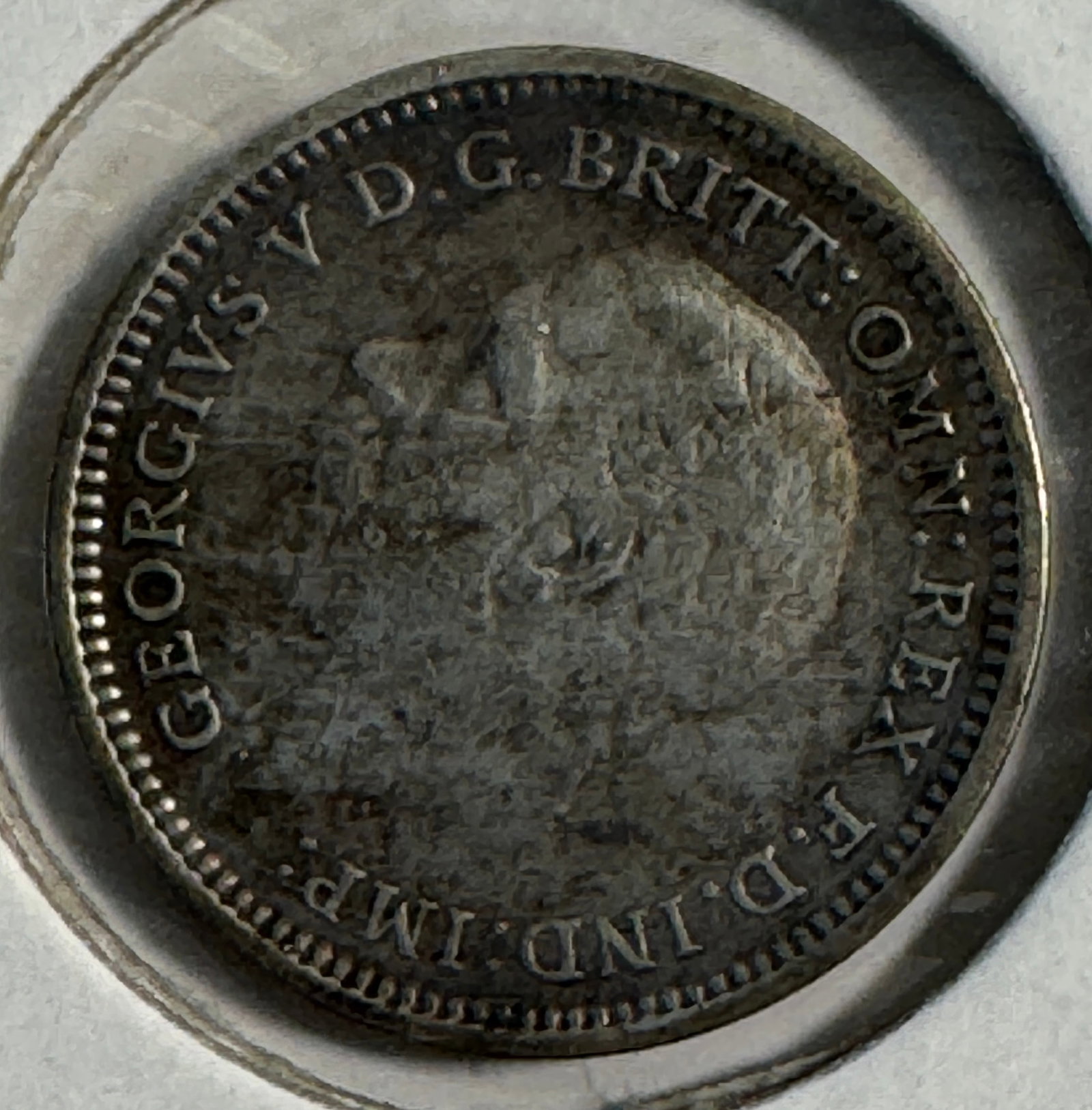 1935 British Threepence .500 Silver Coin - George V: One coin as titled. Ungraded; condition varies. See images.