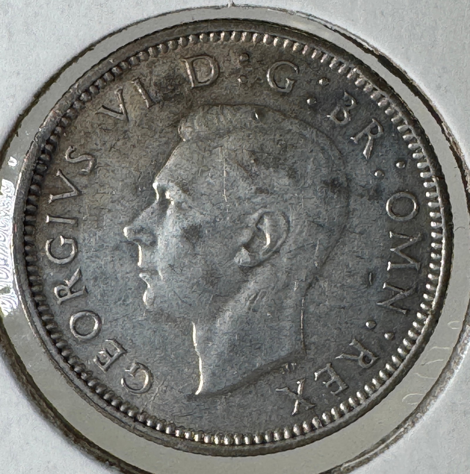 -*1943 Great Britain Sixpence .500 Silver Coin - George VI: One coin as titled. Ungraded; condition varies. See images.