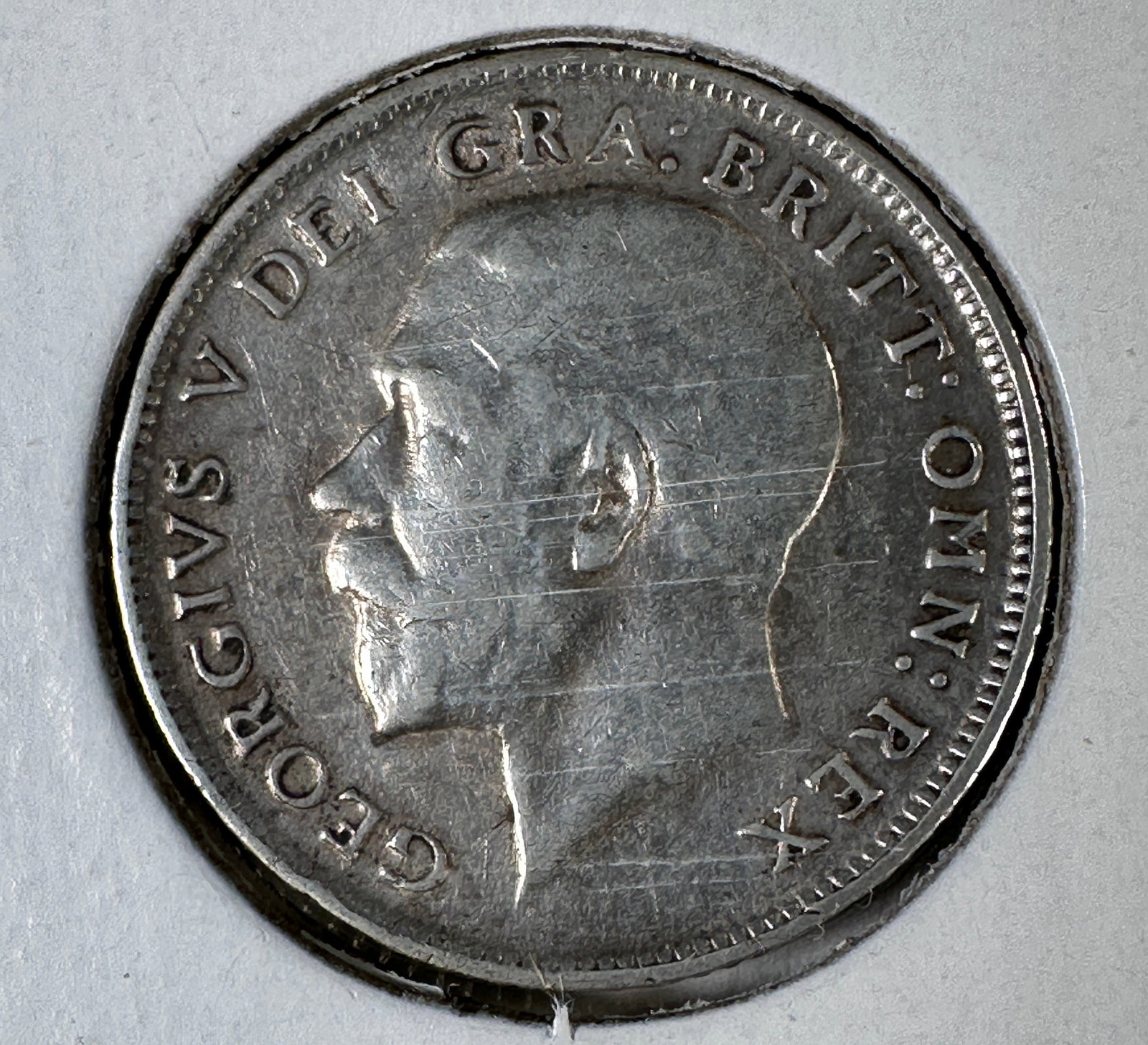 1914 Great Britain Six Pence .925 Silver Coin - George V: One coin as titled. Ungraded; condition varies. See images.