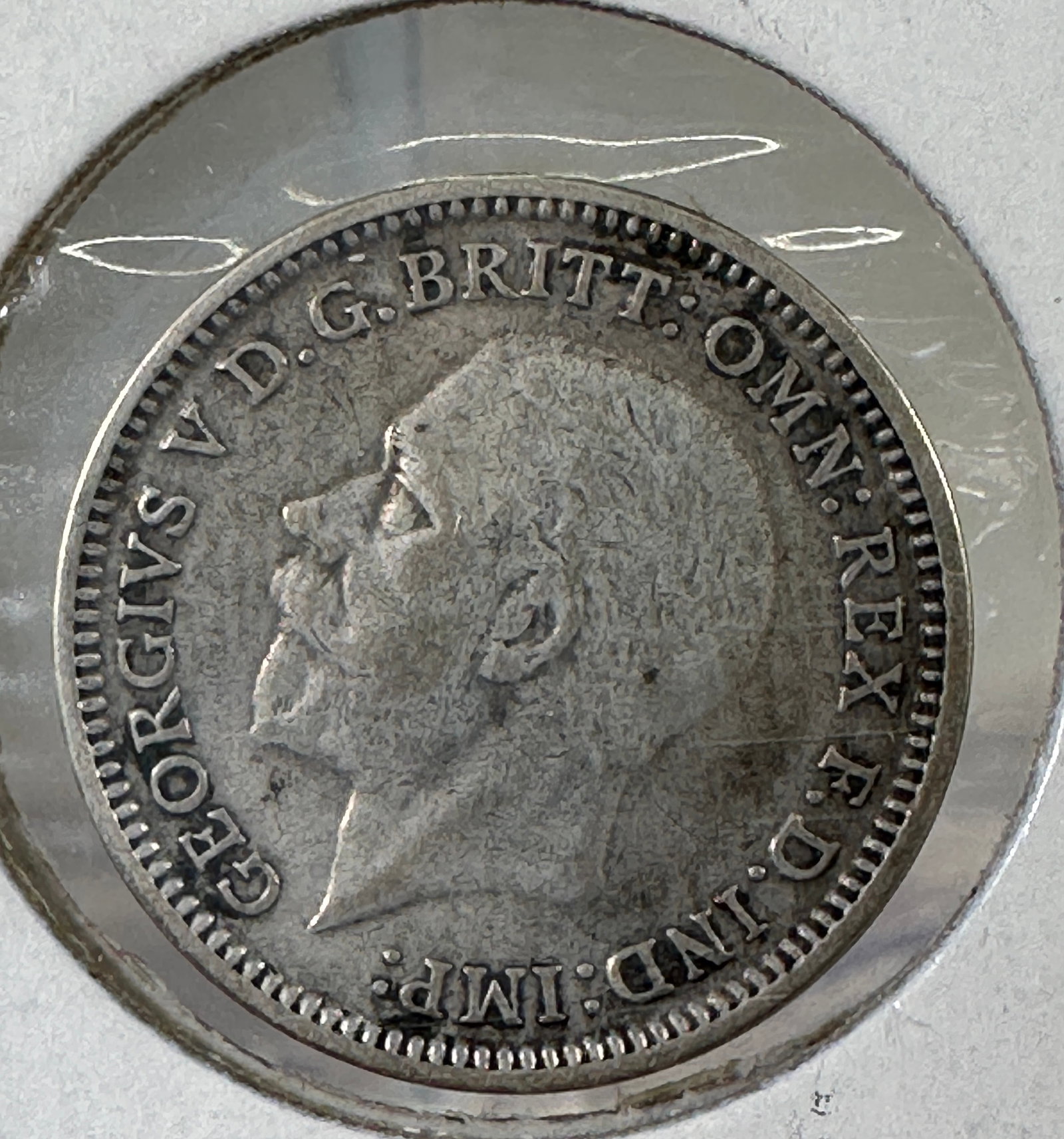 1931 Great Britain 3 Pence .500 Silver Coin - George V: One coin as titled. Ungraded; condition varies. See images.